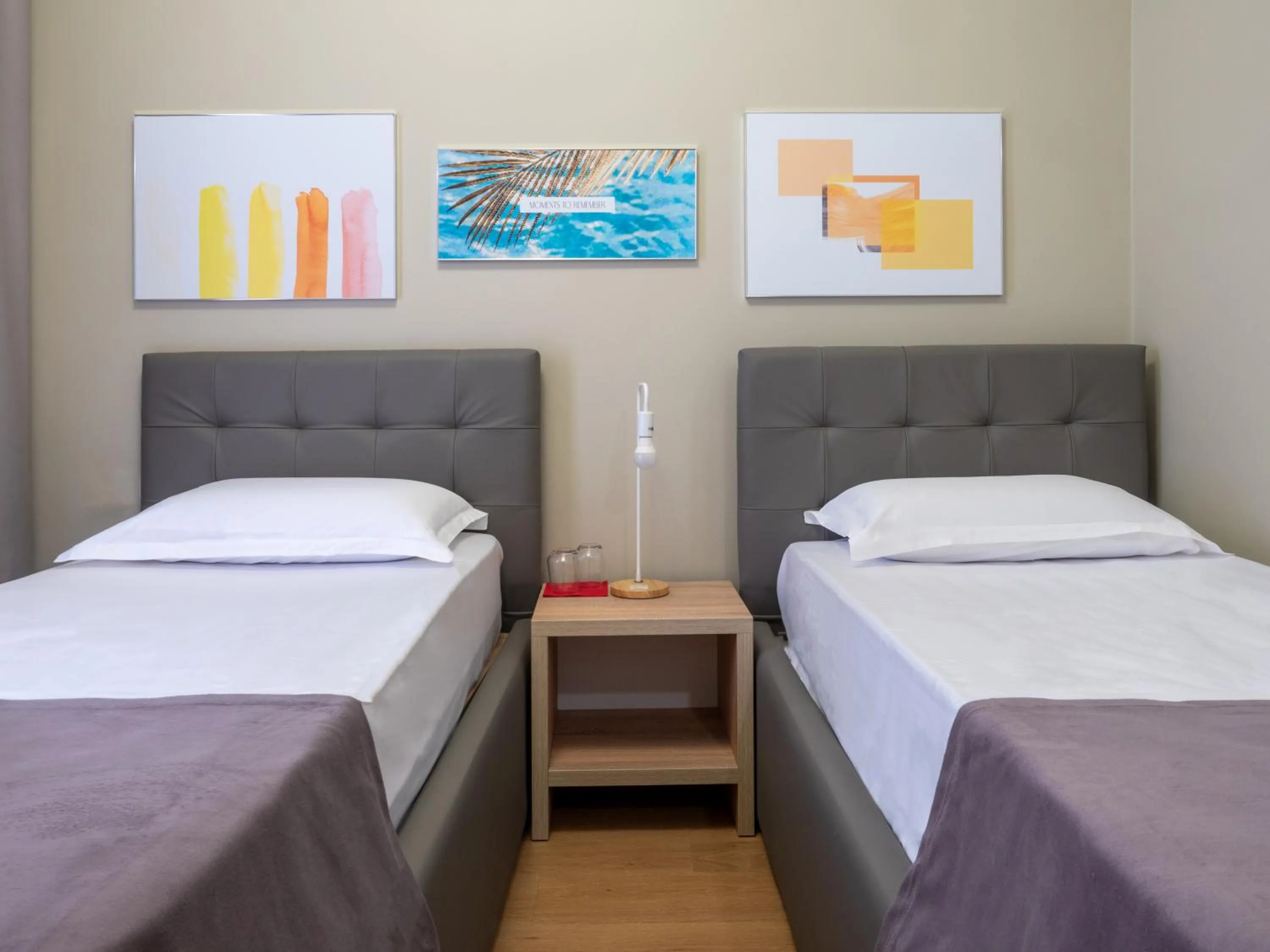 Bed in Nia Boutique Hotel by Rapo's Resort