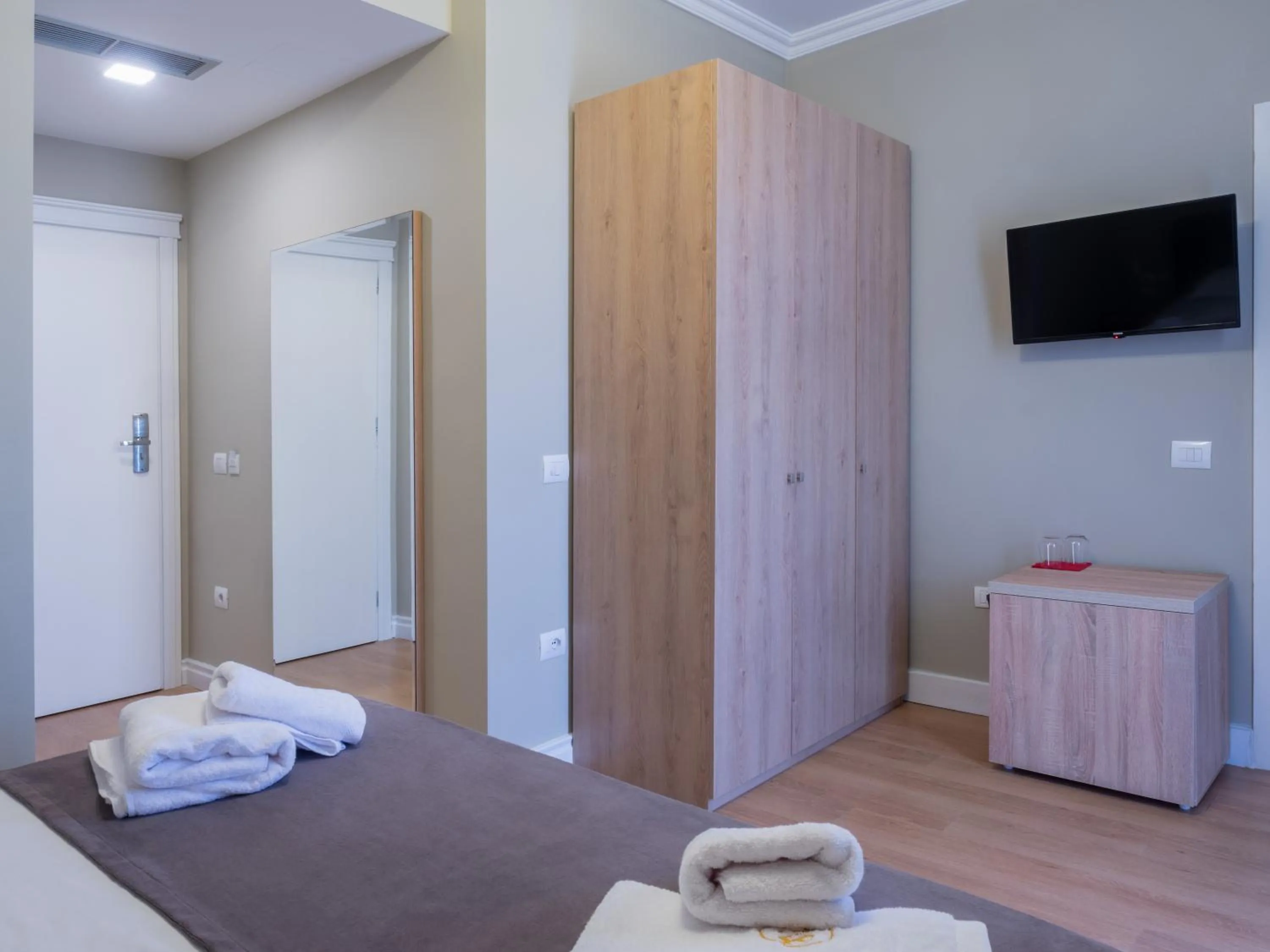 Bed in Nia Boutique Hotel by Rapo's Resort