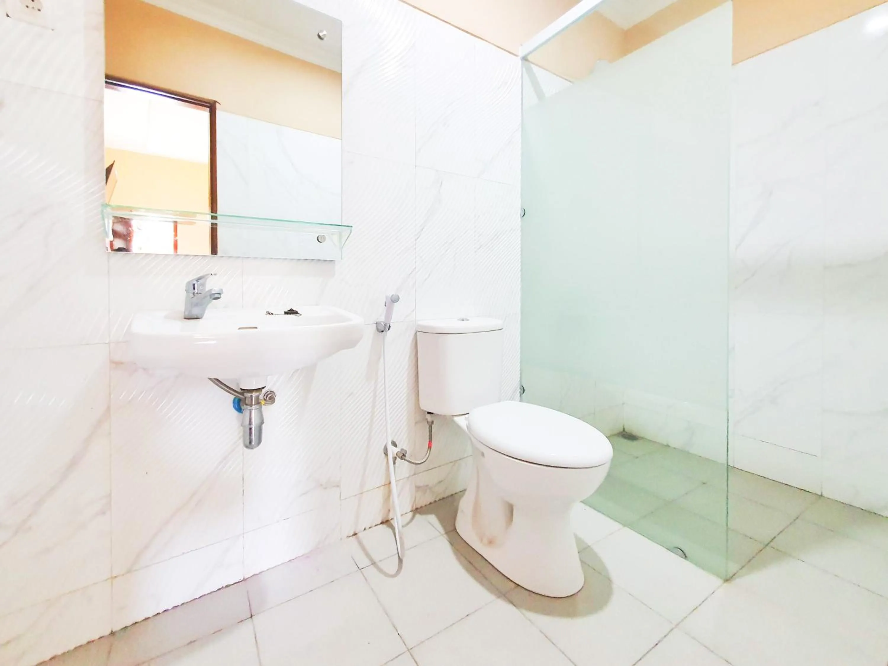 Bathroom in RedDoorz Syariah at Graha Adi Karya Kartasura