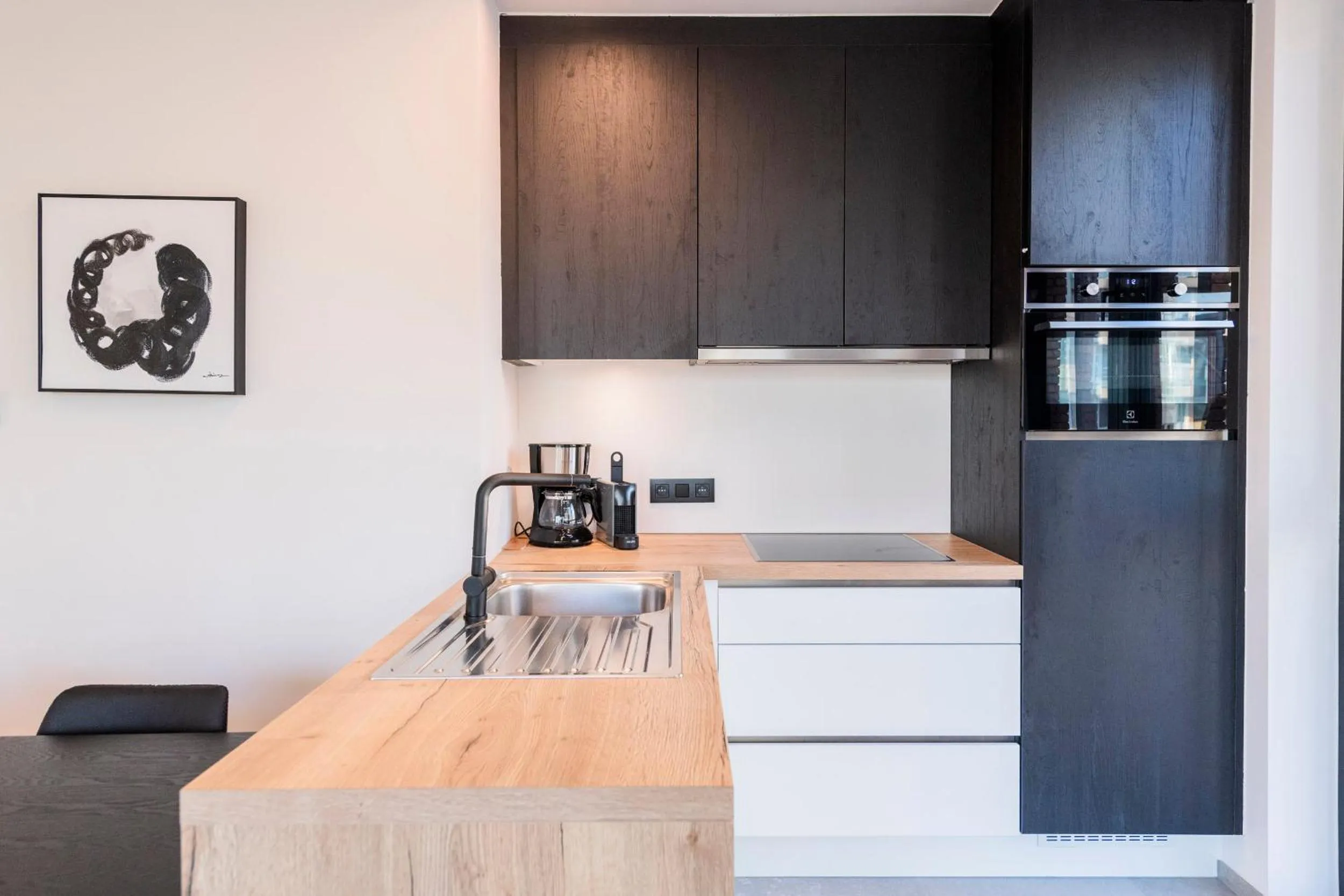 kitchen in Belcasa Beach Suites & Lofts Aparthotel