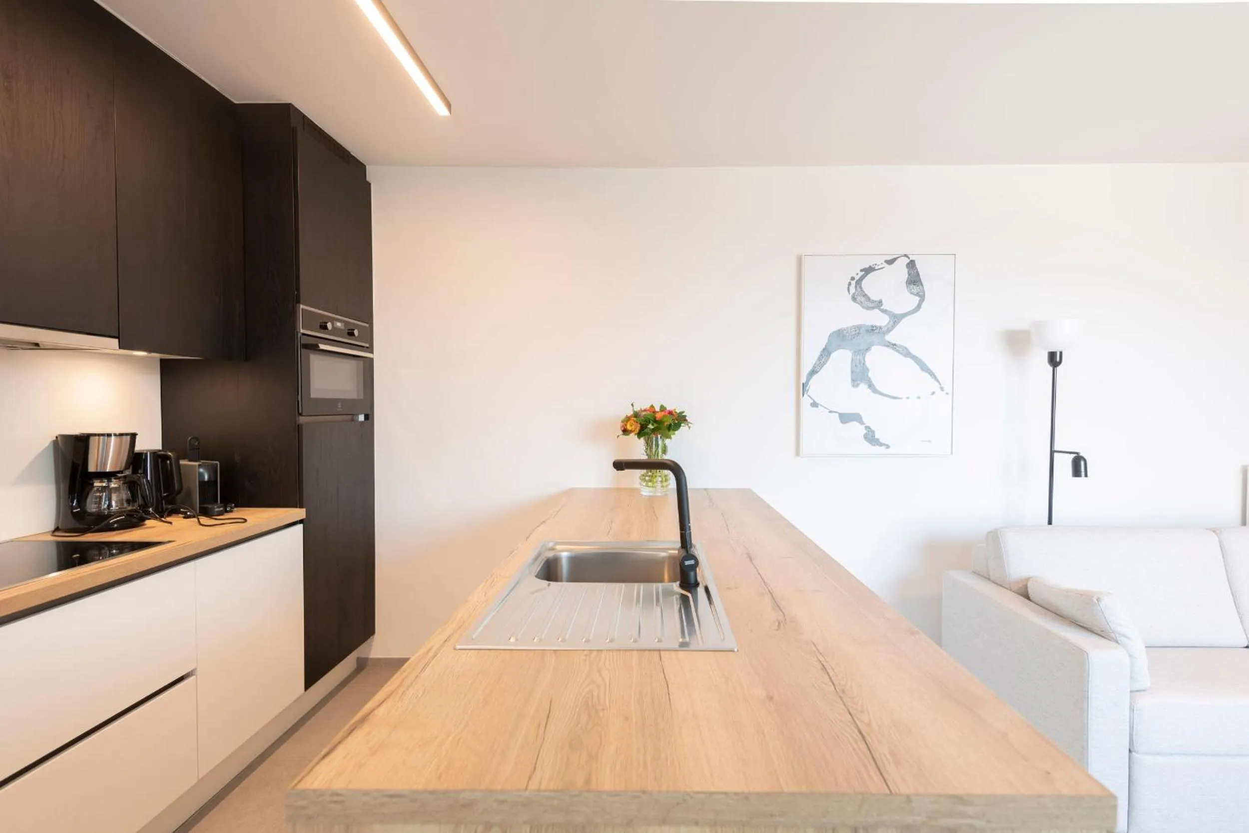 kitchen in Belcasa Beach Suites & Lofts Aparthotel