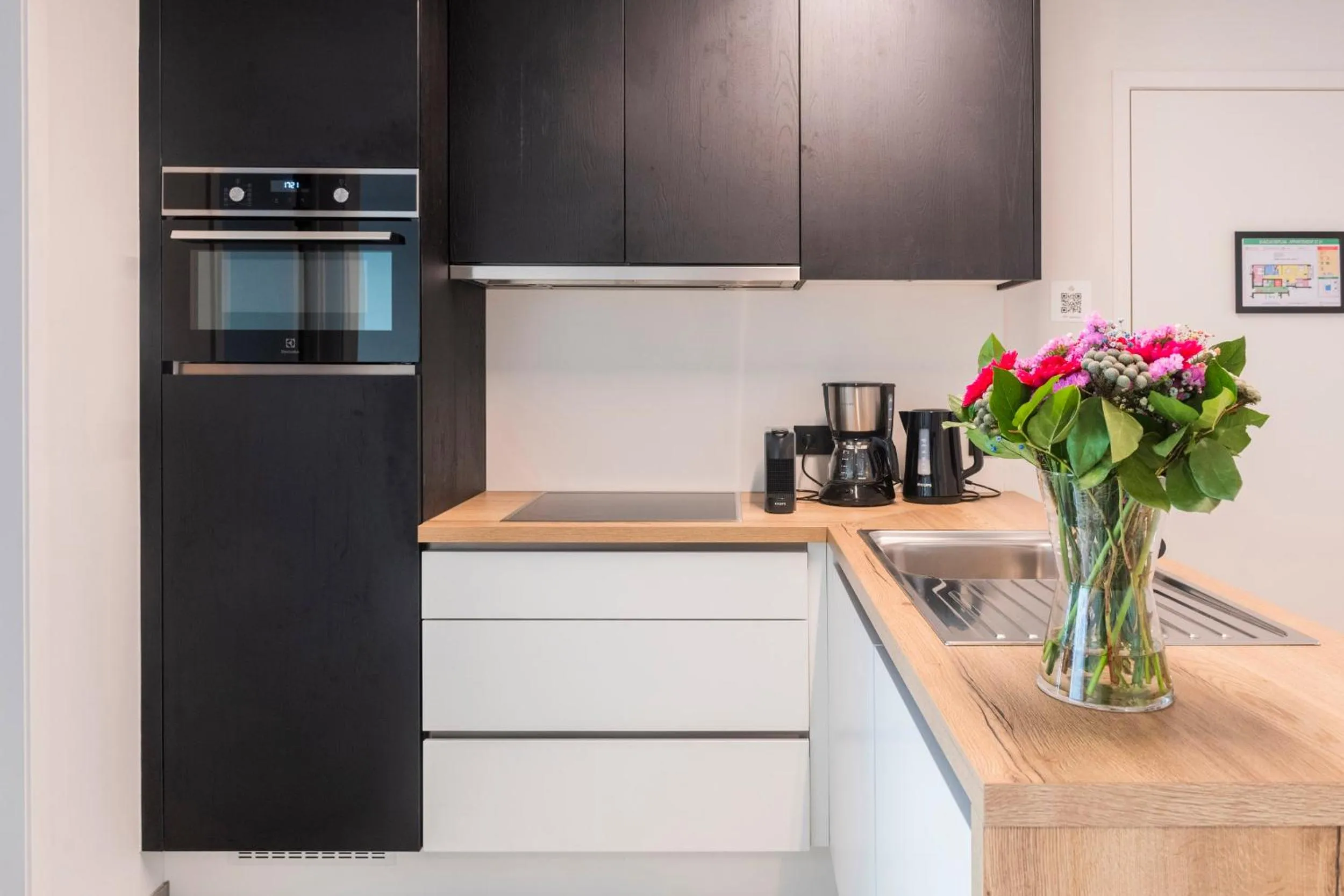 kitchen in Belcasa Beach Suites & Lofts Aparthotel