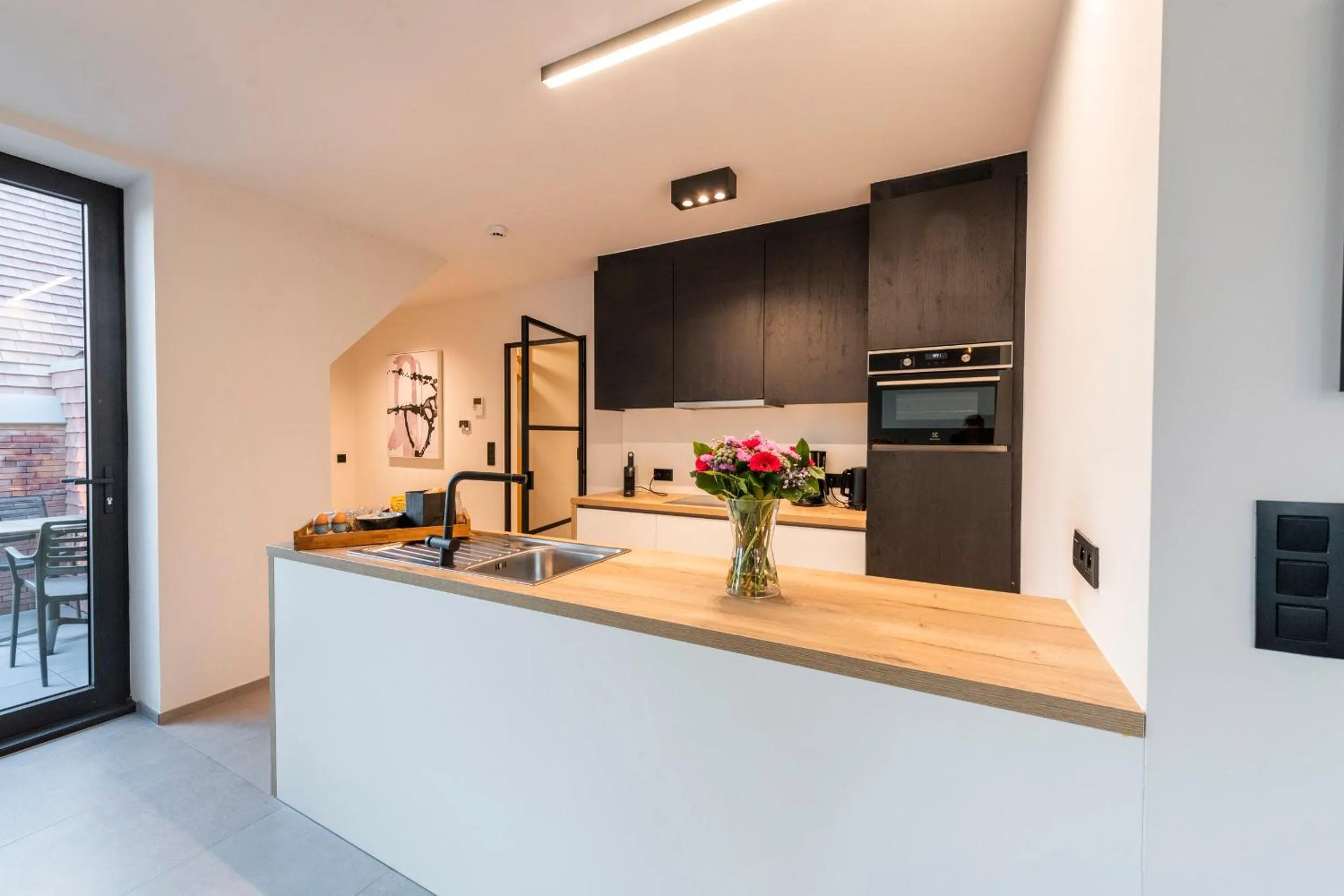 kitchen in Belcasa Beach Suites & Lofts Aparthotel