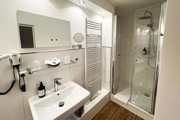 Bathroom in Ihr Ferien Hotel Brunnenhof