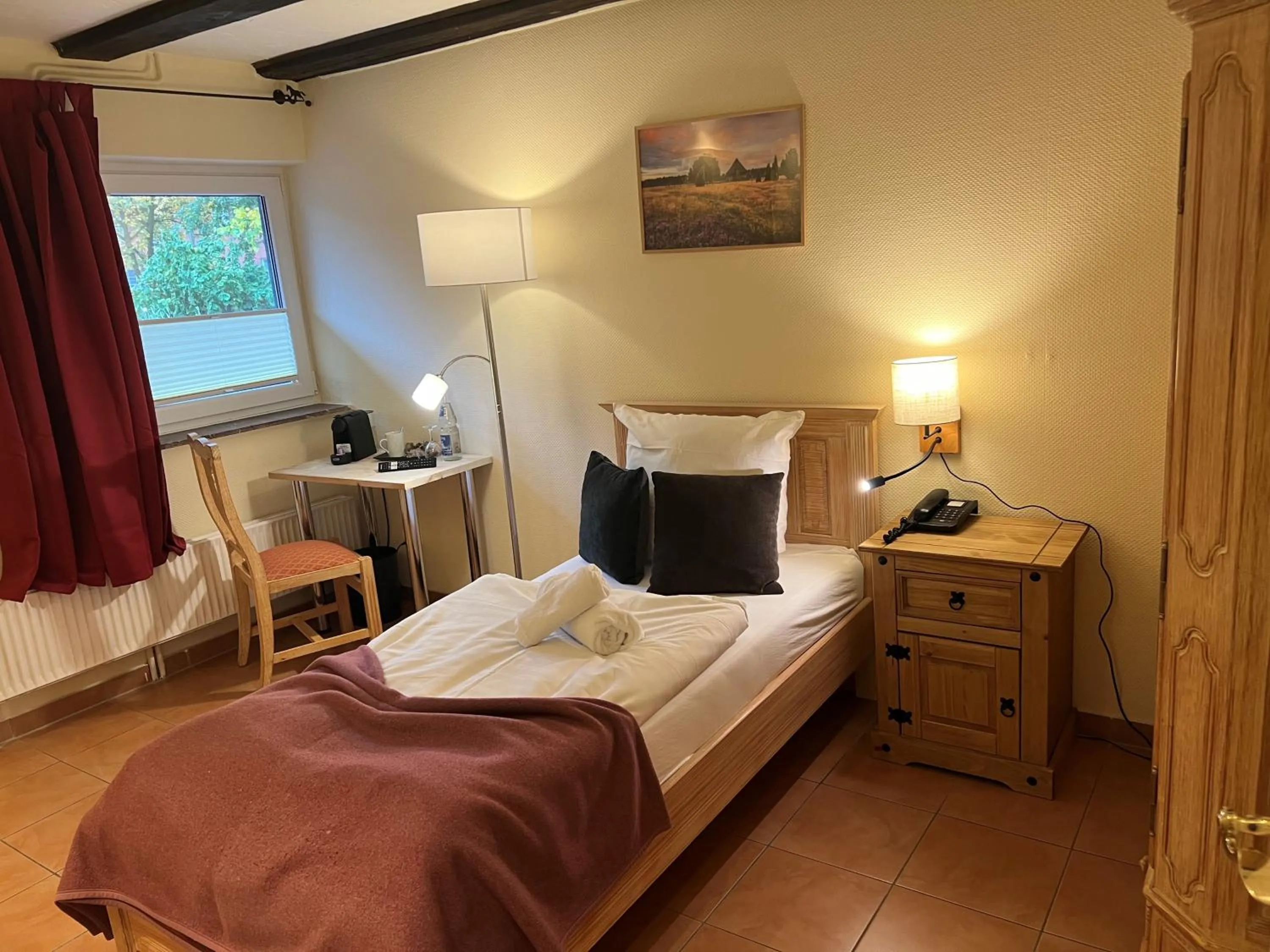 Bed in Ihr Ferien Hotel Brunnenhof