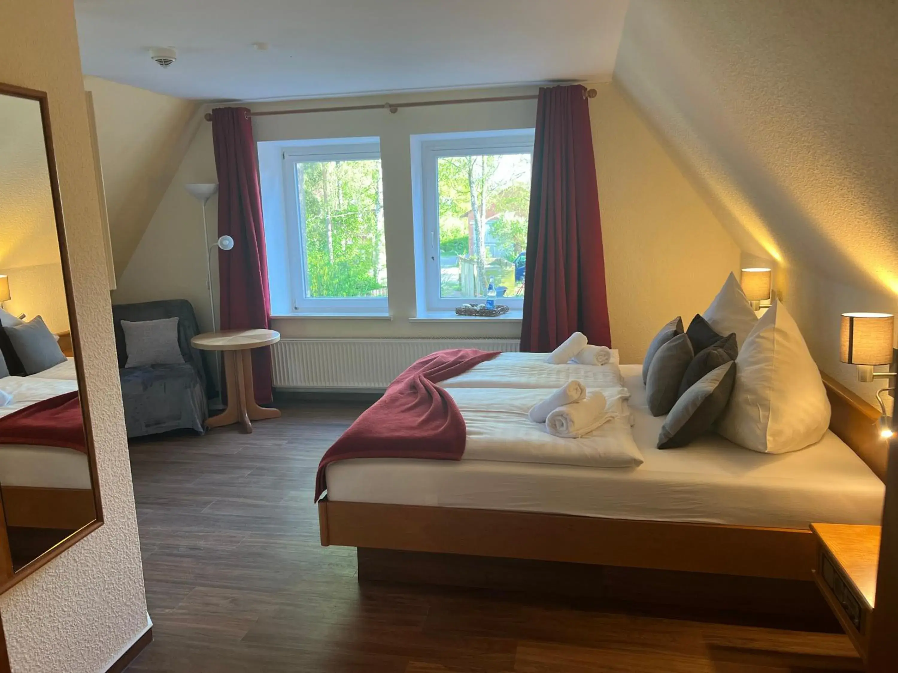 Triple Room in Ihr Ferien Hotel Brunnenhof Triple Room in Ihr Ferien Hotel Brunnenhof