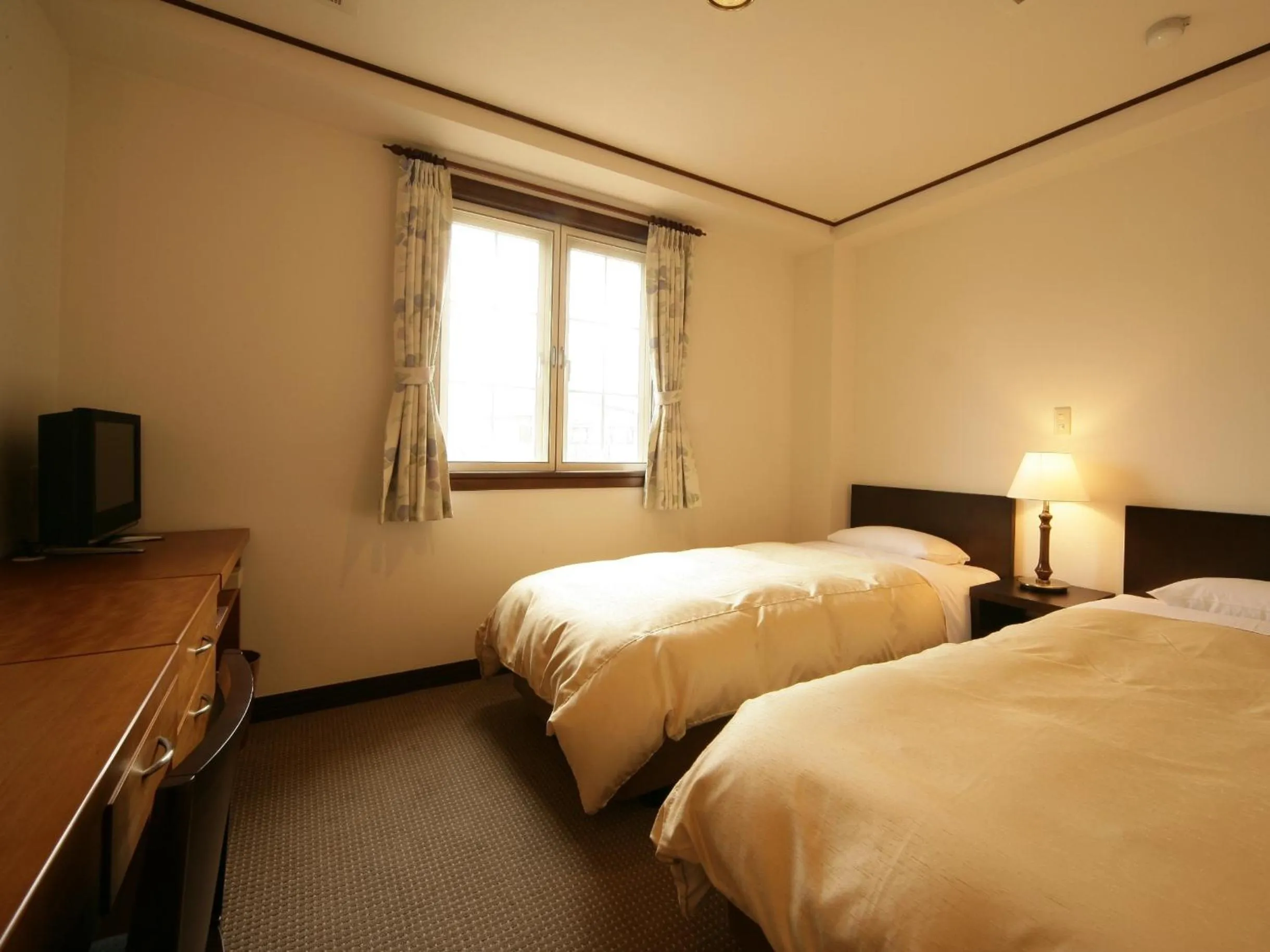 Photo of the whole room, Bed in Hotel Petit Riviere Karuizawa