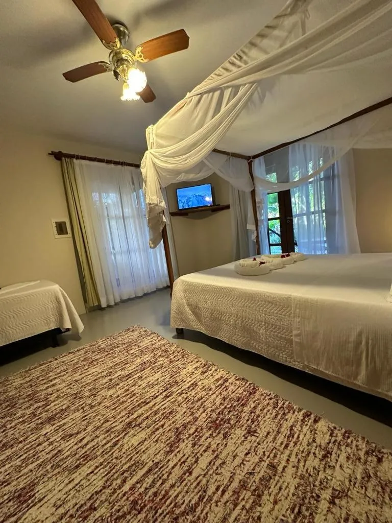 Bed in Pousada Santo Mar