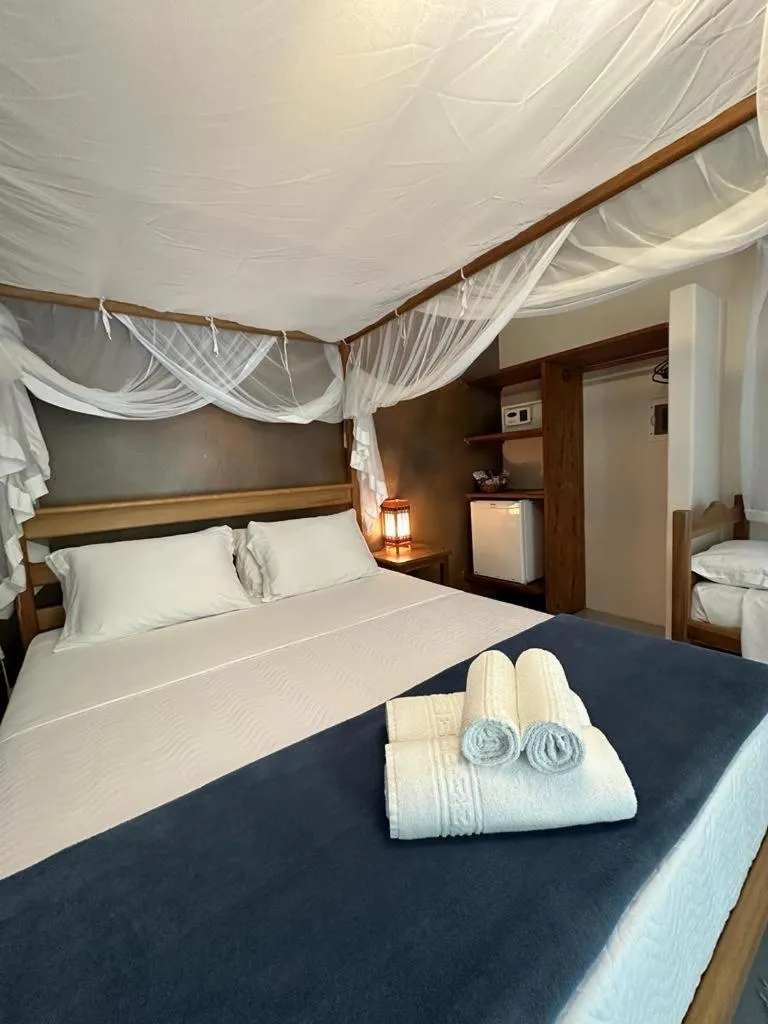 Bed in Pousada Santo Mar