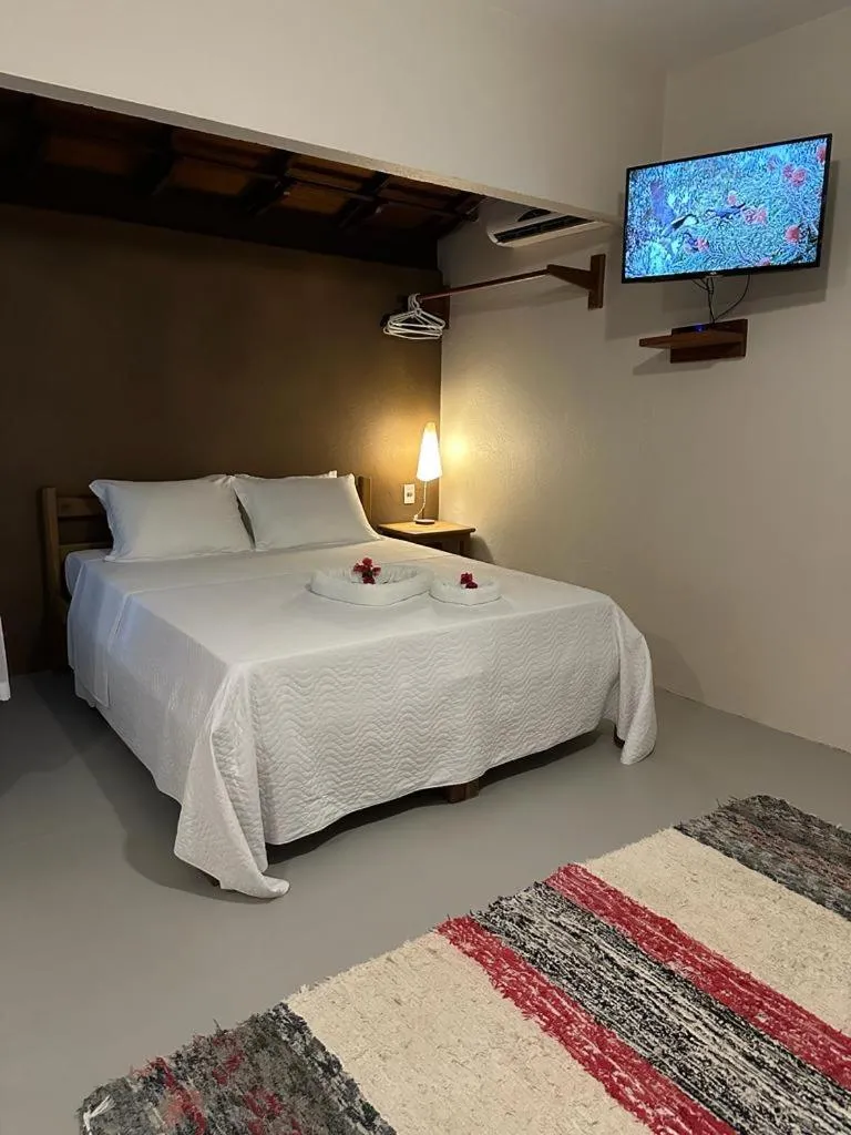 Bed in Pousada Santo Mar
