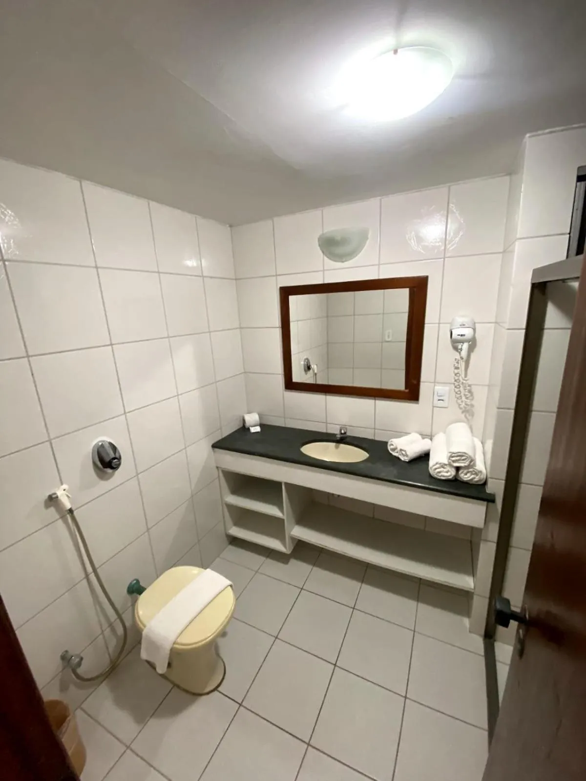Toilet in JL Temporadas - Quarto Portobello Park Hotel