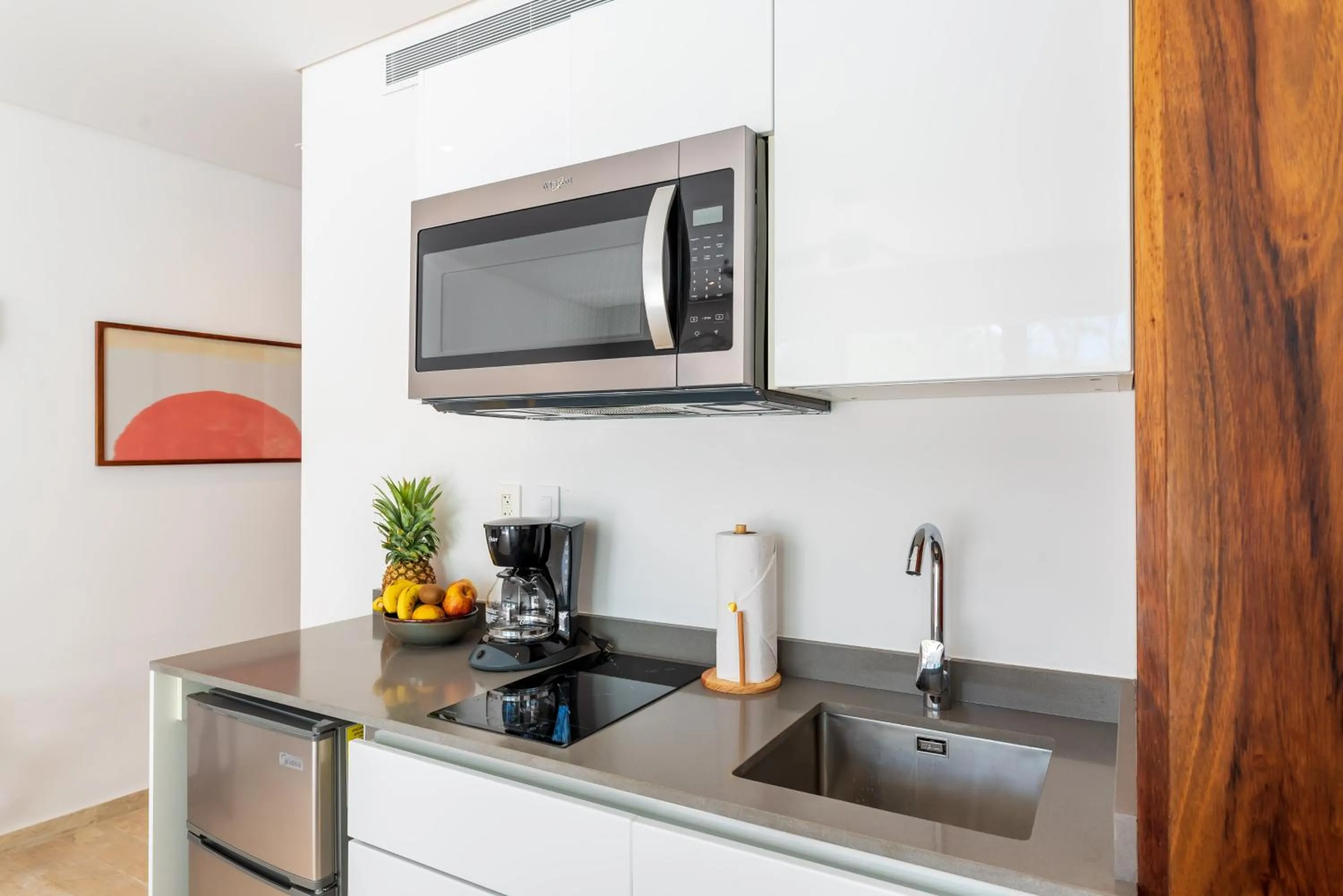 Kitchen or kitchenette in Central Park Lagunas by Sandy Powerful