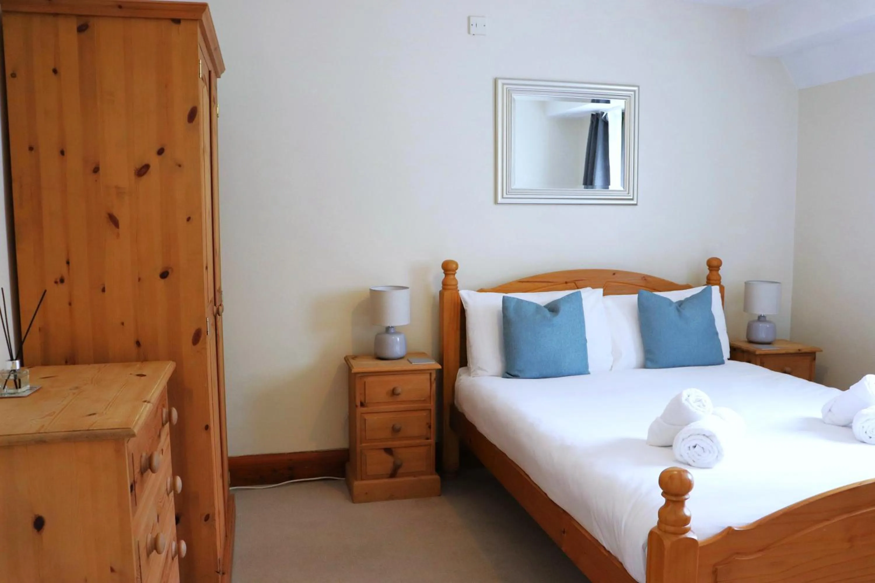 Bed in Glyndley Manor Cottages