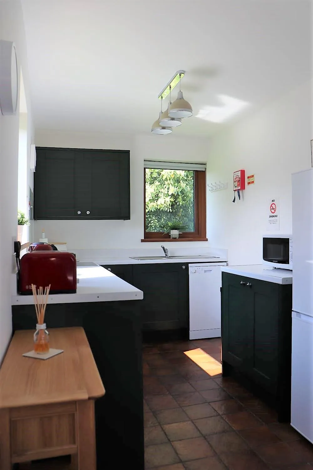 Kitchen or kitchenette in Glyndley Manor Cottages