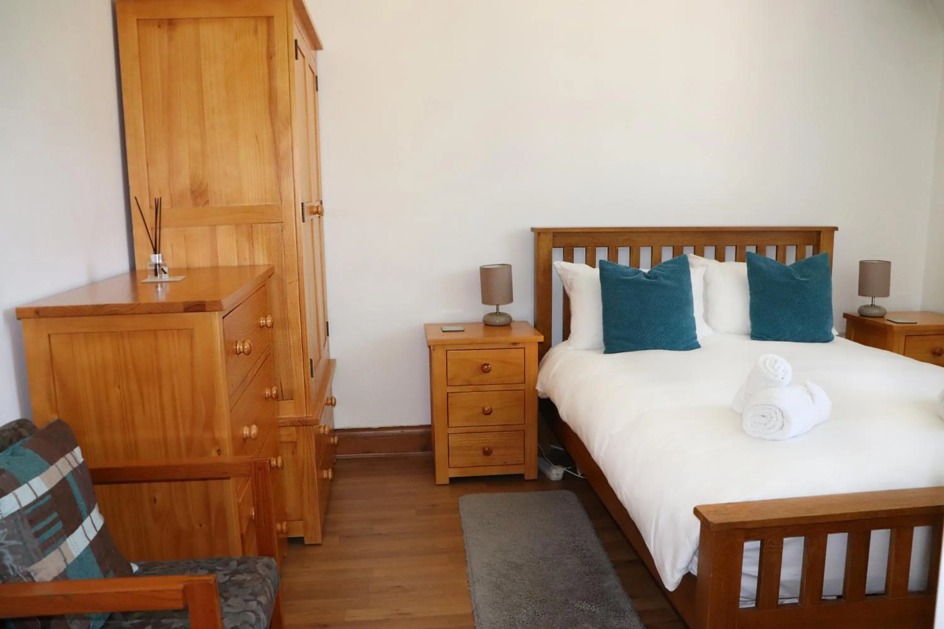 Bed in Glyndley Manor Cottages