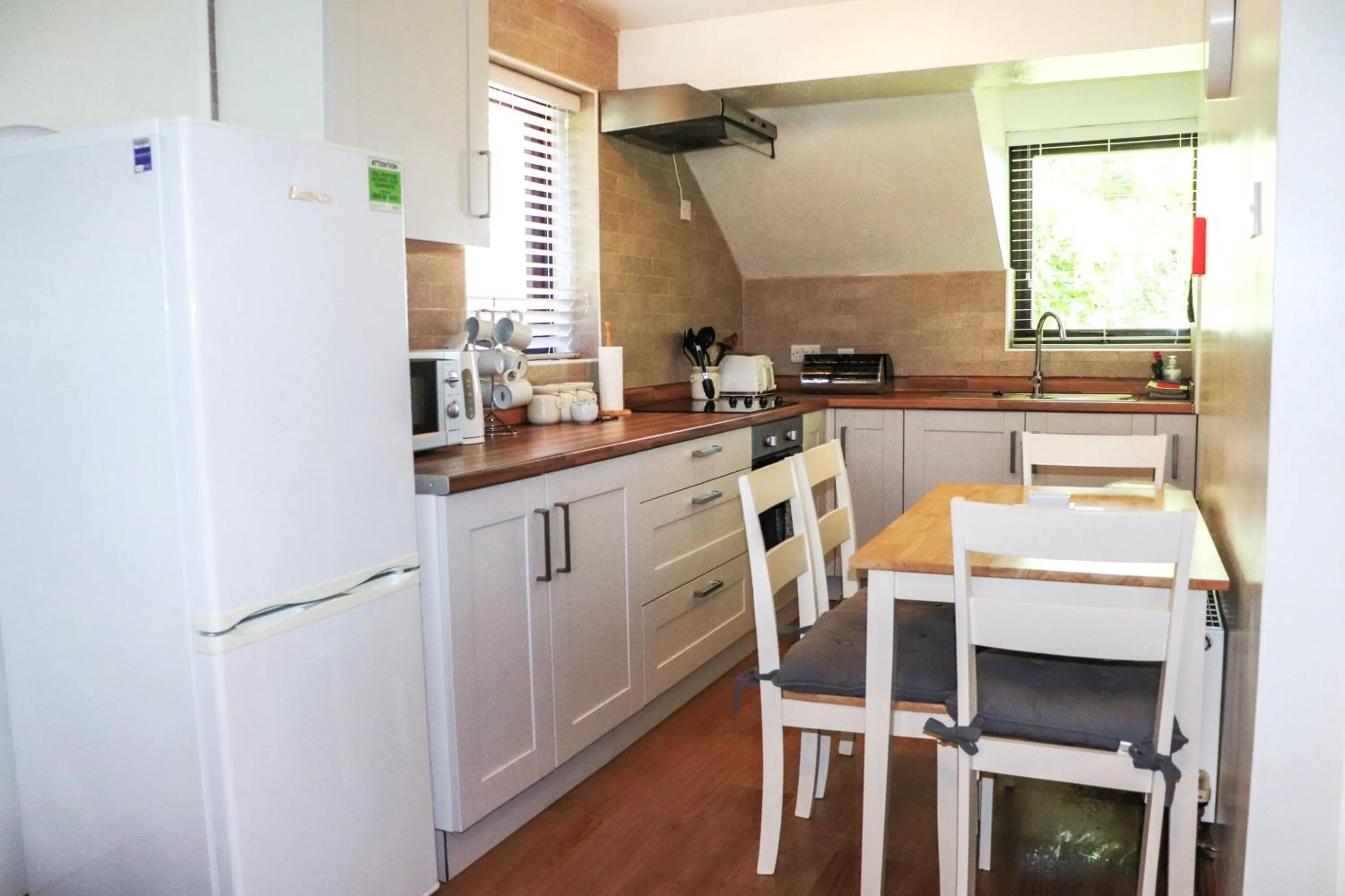 Kitchen or kitchenette in Glyndley Manor Cottages
