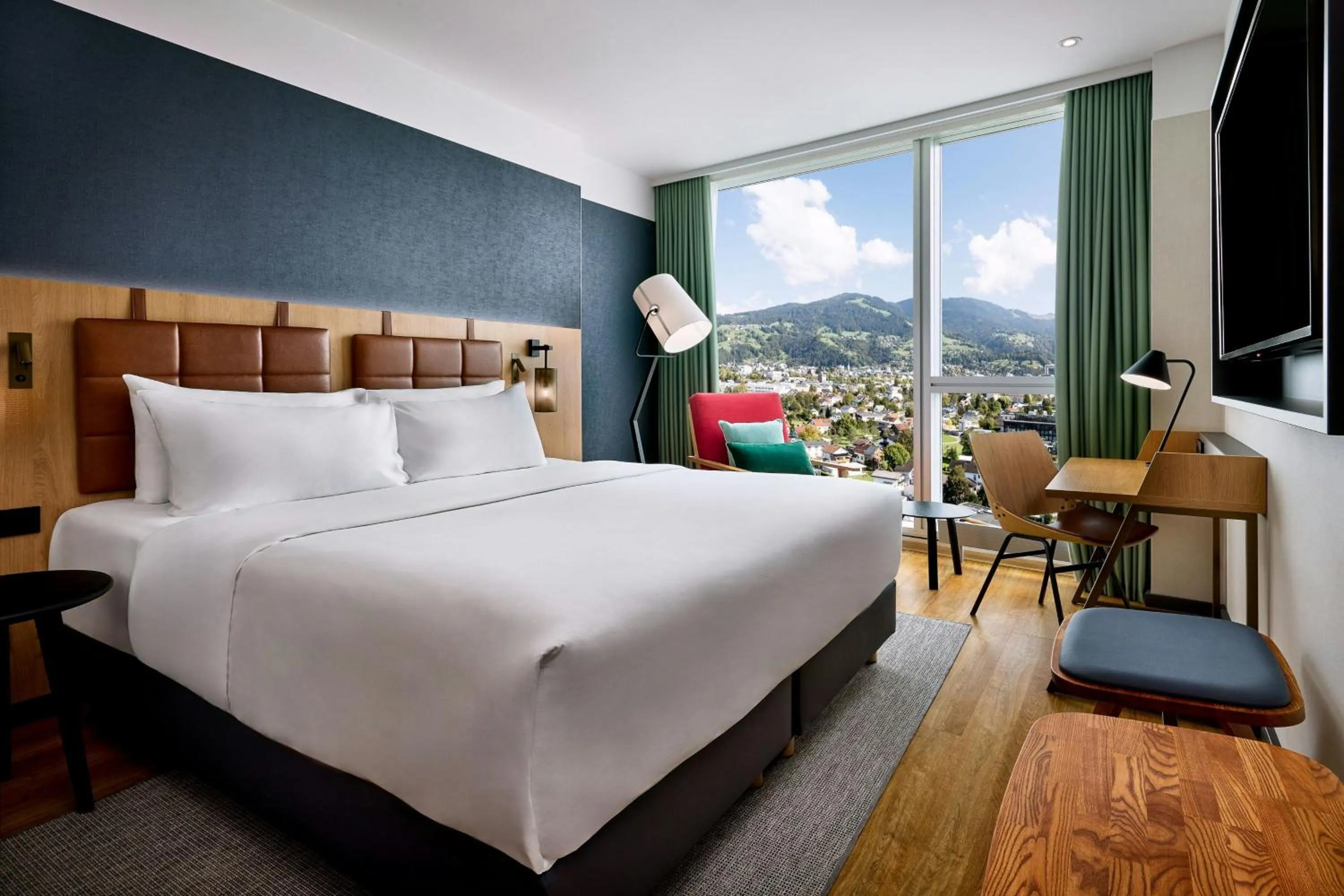 Photo of the whole room, Bed in Four Points by Sheraton Panoramahaus Dornbirn