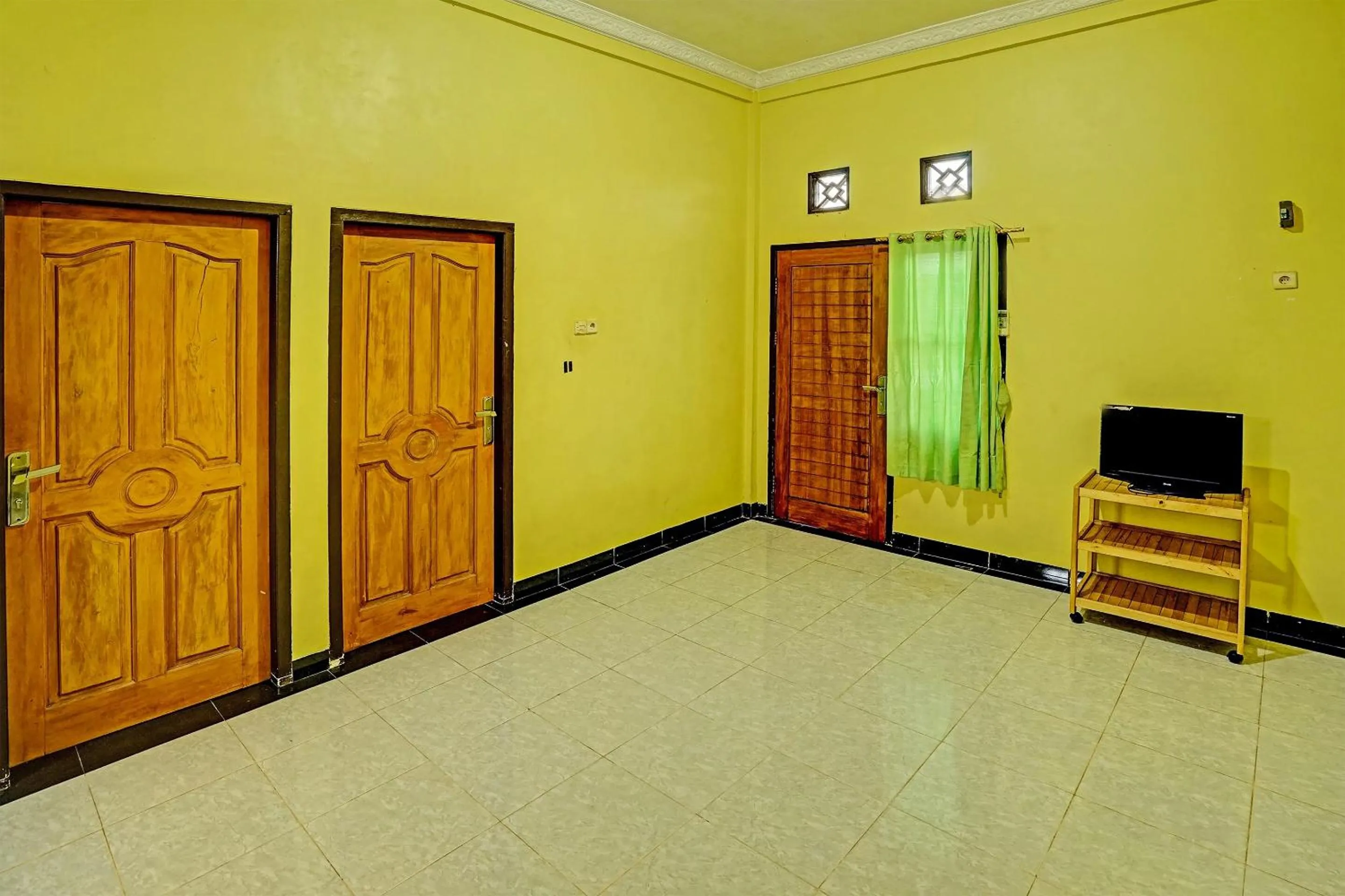 Bedroom in OYO 90508 Wisma Kenanga