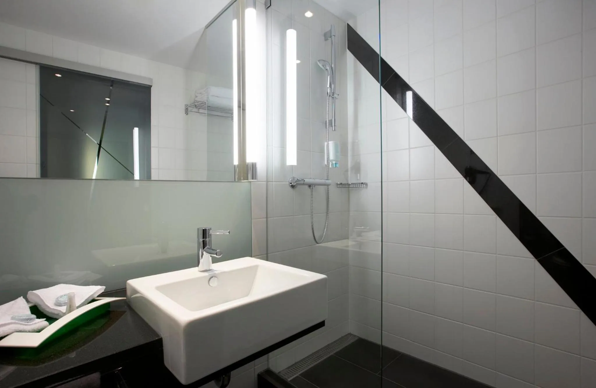 Bathroom in Holiday Inn Bern Westside by IHG