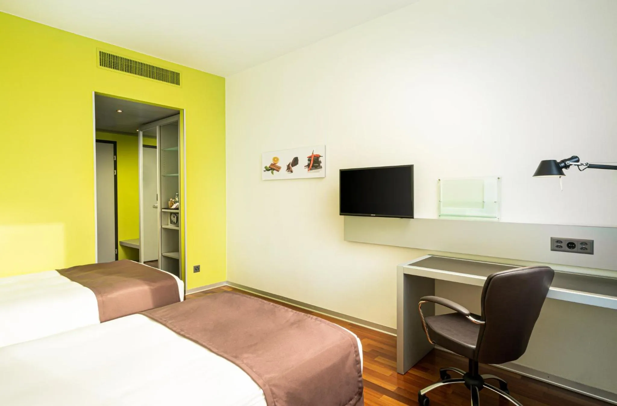 Photo of the whole room, Bed in Holiday Inn Bern Westside by IHG