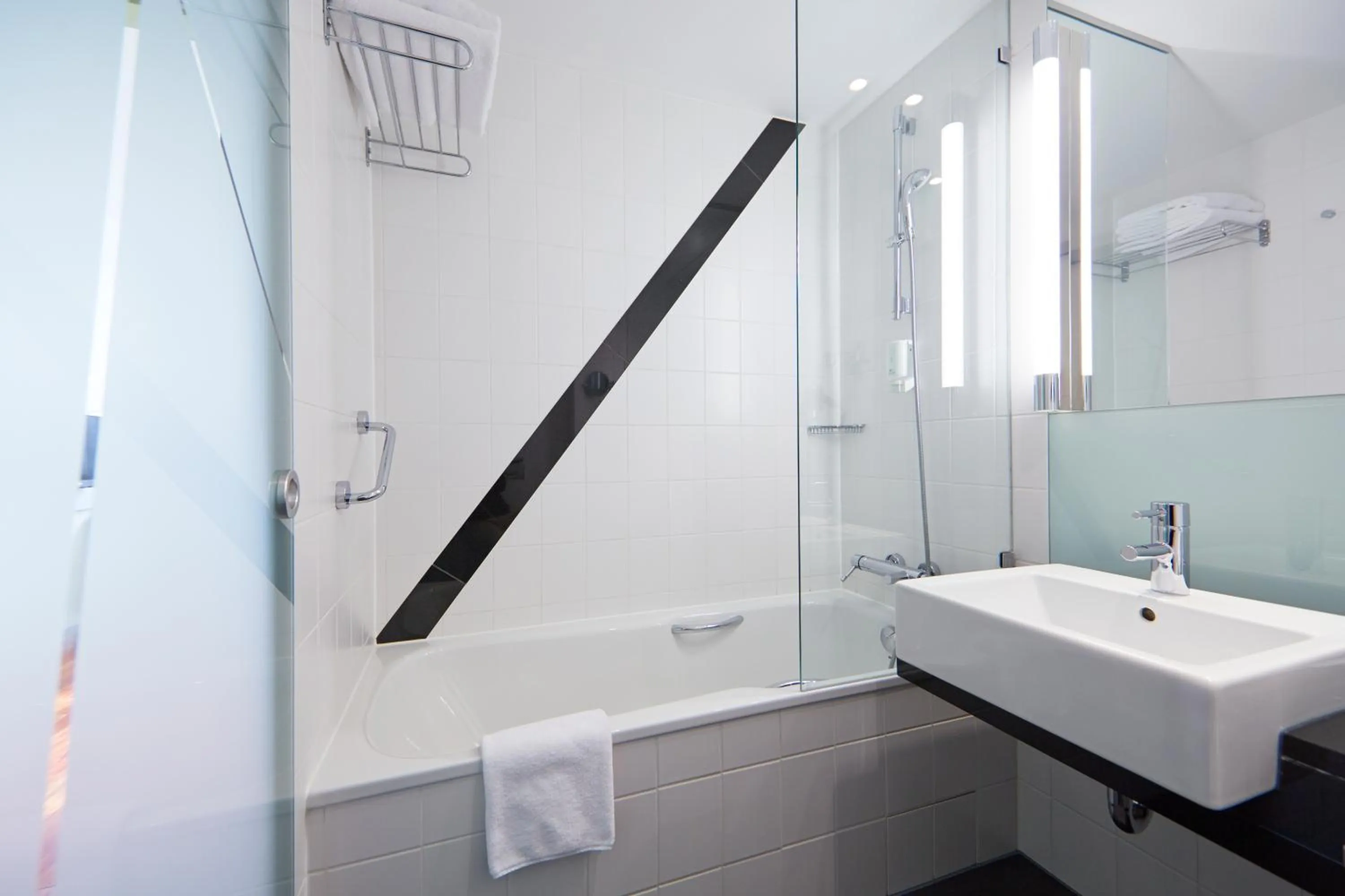 Bathroom in Holiday Inn Bern Westside by IHG