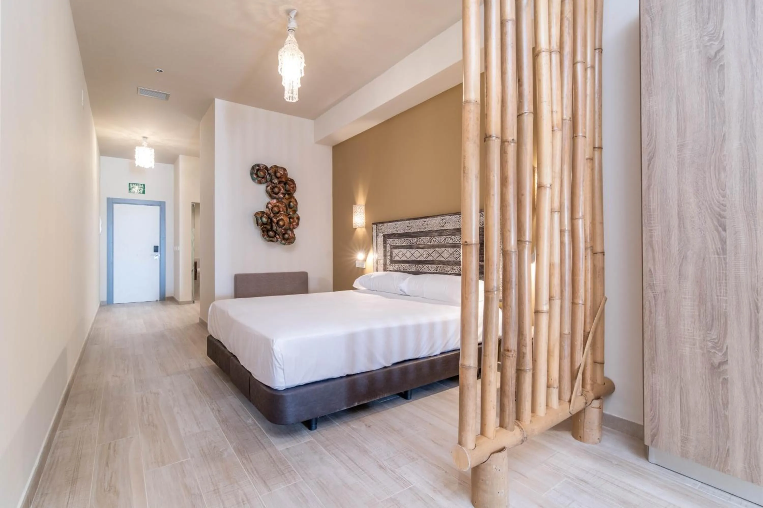 Bed in Tarifa Suites by QHotels
