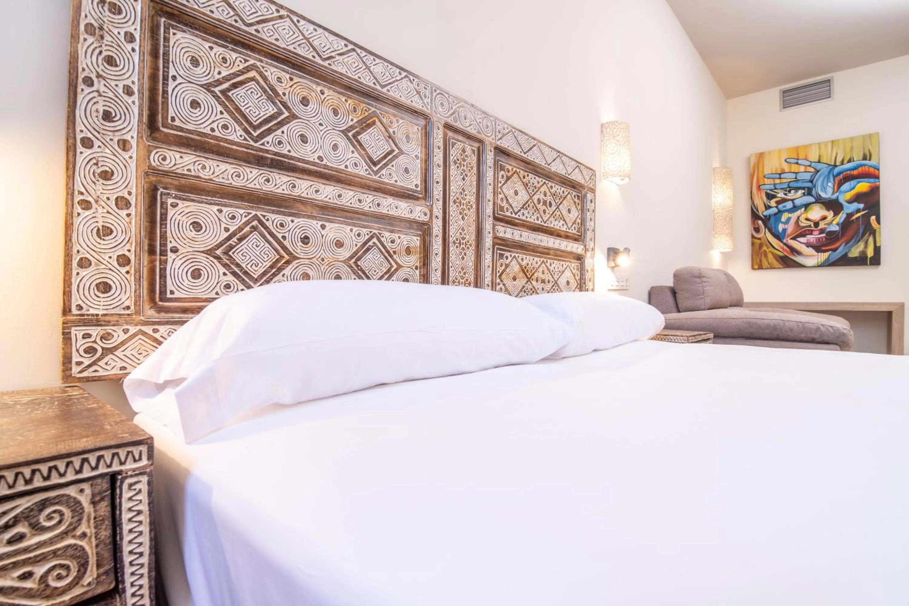 Bed in Tarifa Suites by QHotels