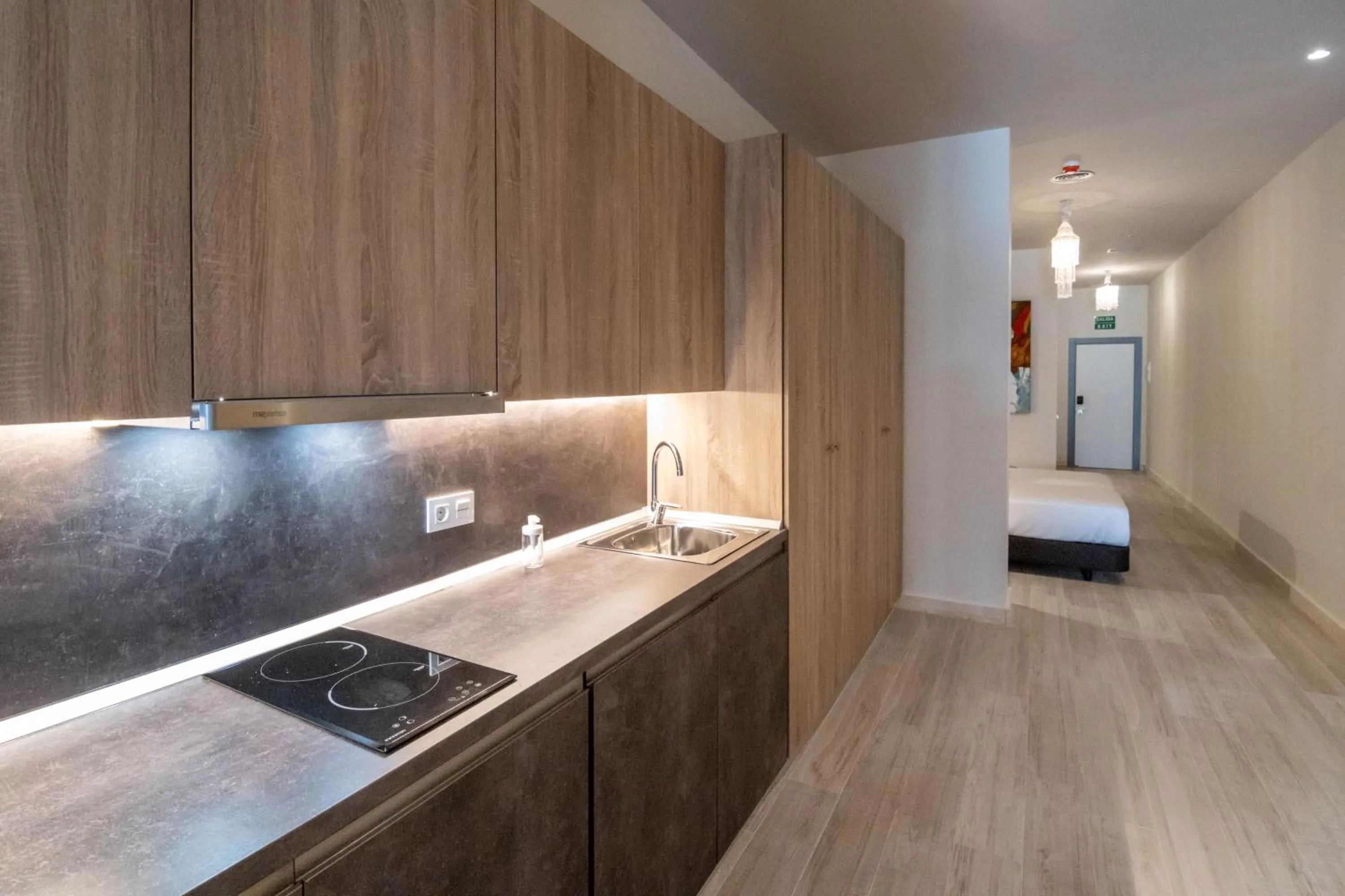 Kitchen or kitchenette in Tarifa Suites by QHotels
