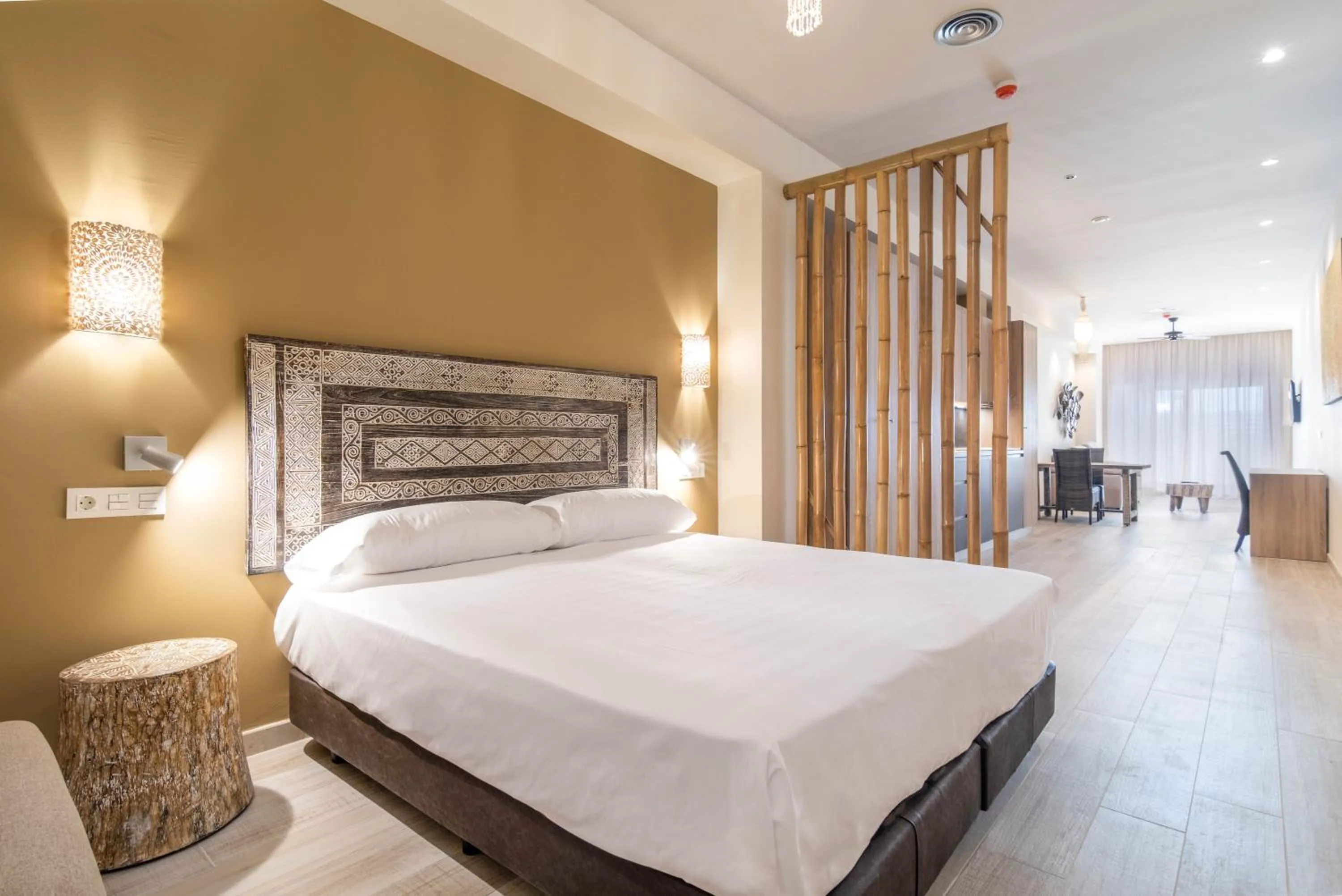 Bed in Tarifa Suites by QHotels