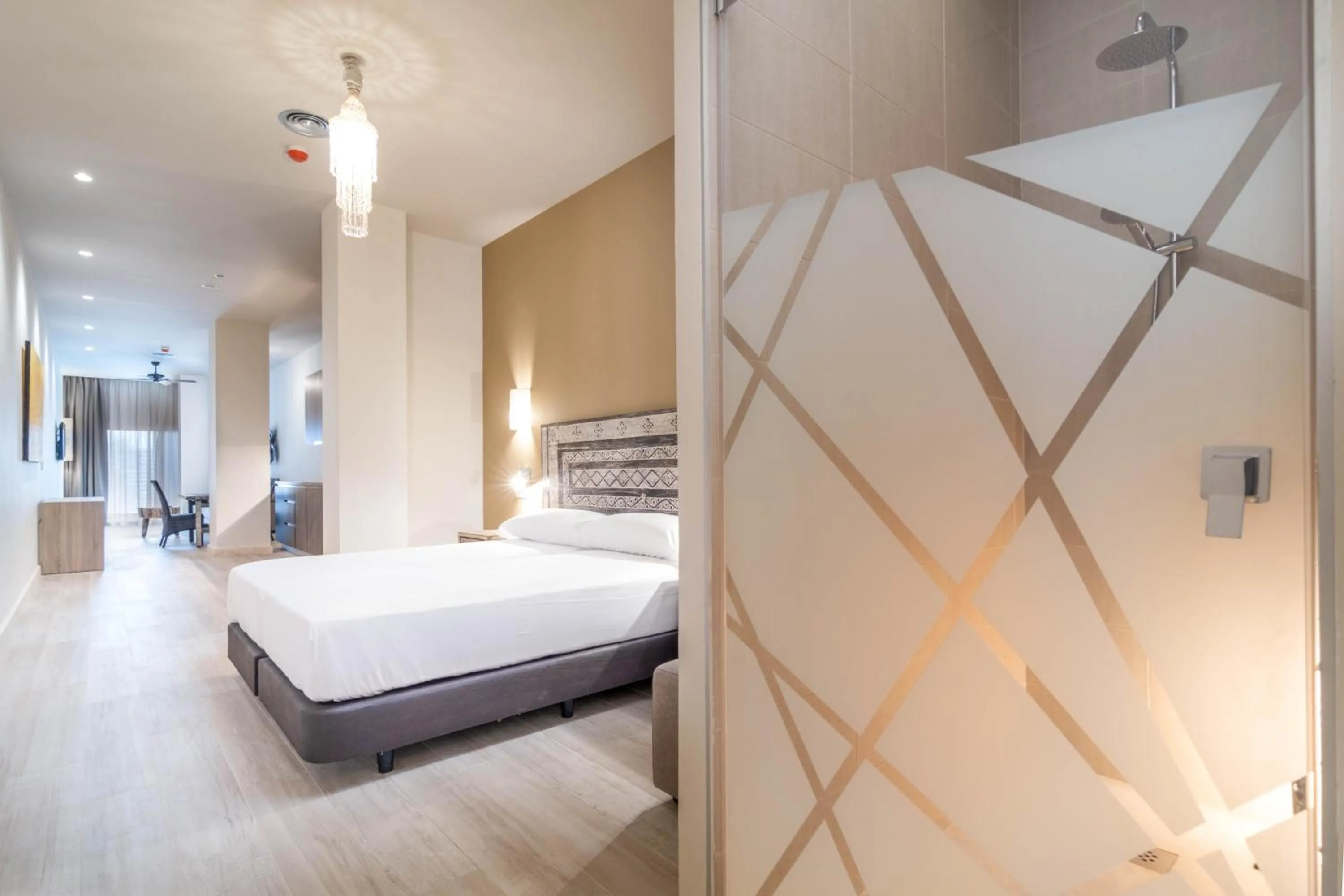 Bedroom, Bed in Tarifa Suites by QHotels