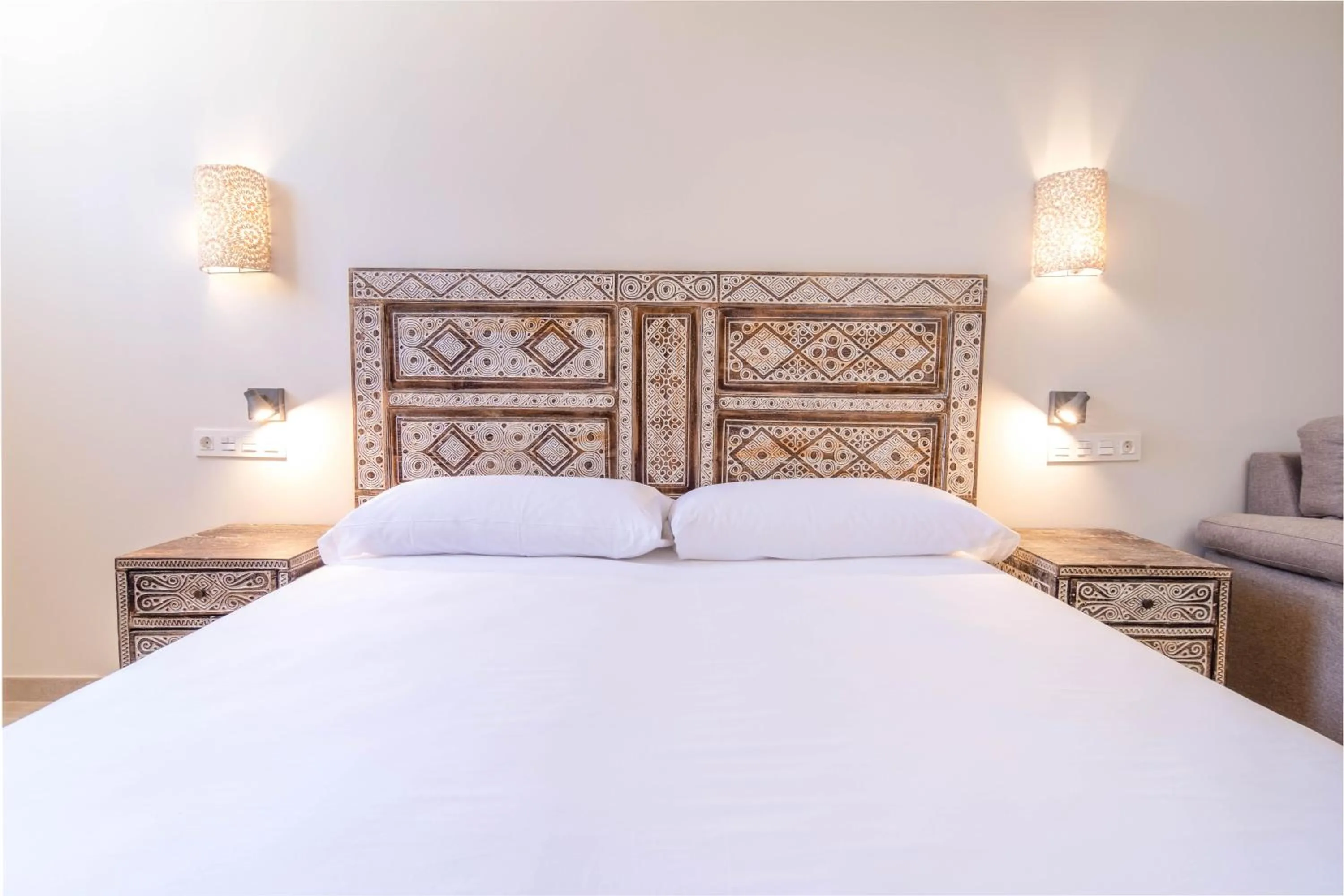 Bed in Tarifa Suites by QHotels
