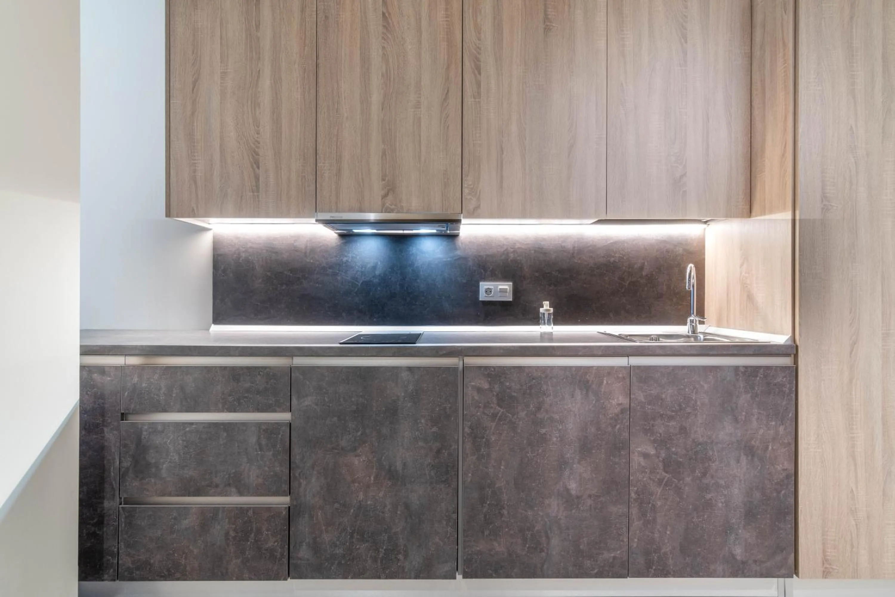 Kitchen or kitchenette in Tarifa Suites by QHotels