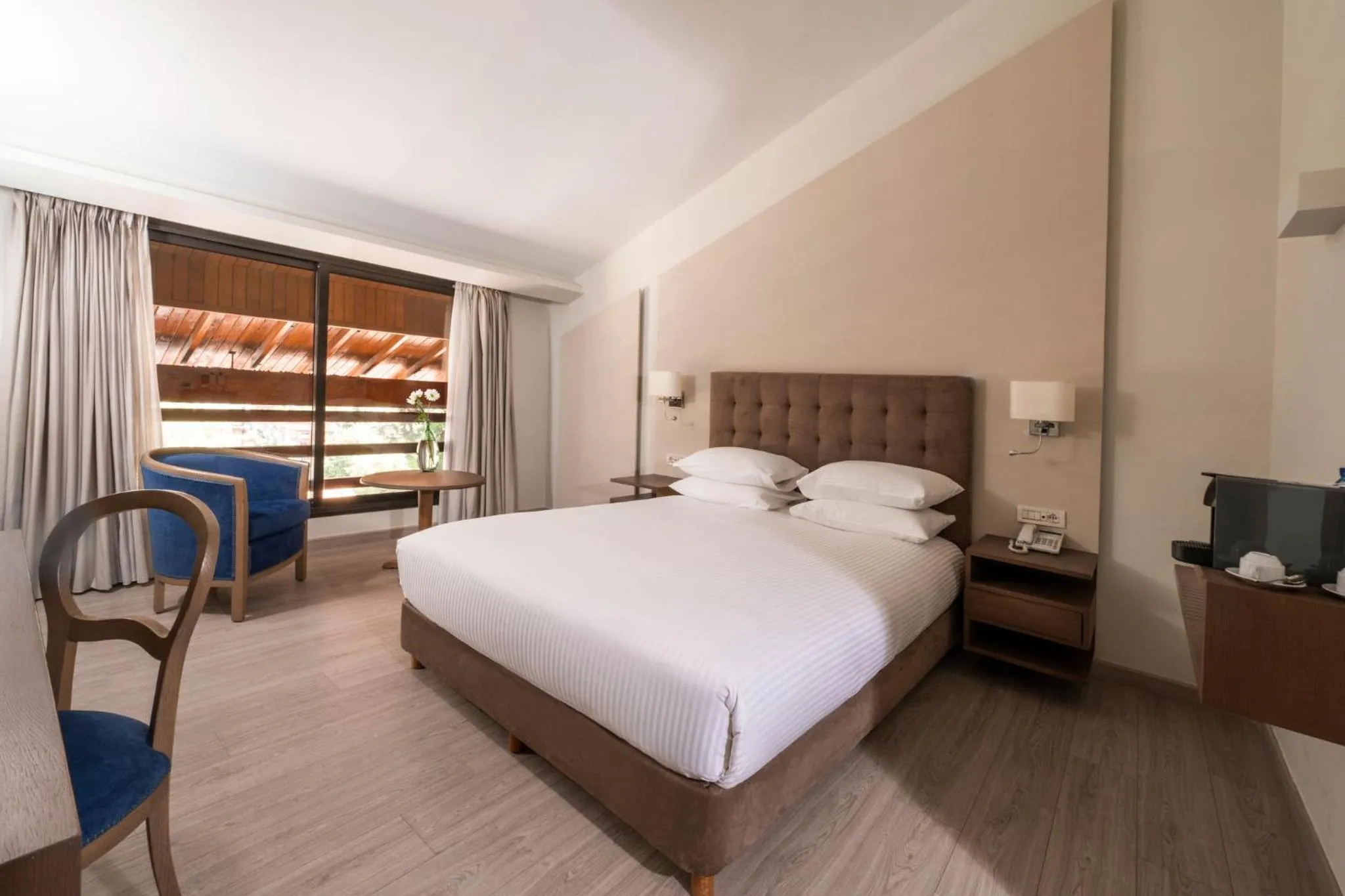 Photo of the whole room, Bed in InterContinental Mzaar Lebanon Mountain Resort & Spa by IHG