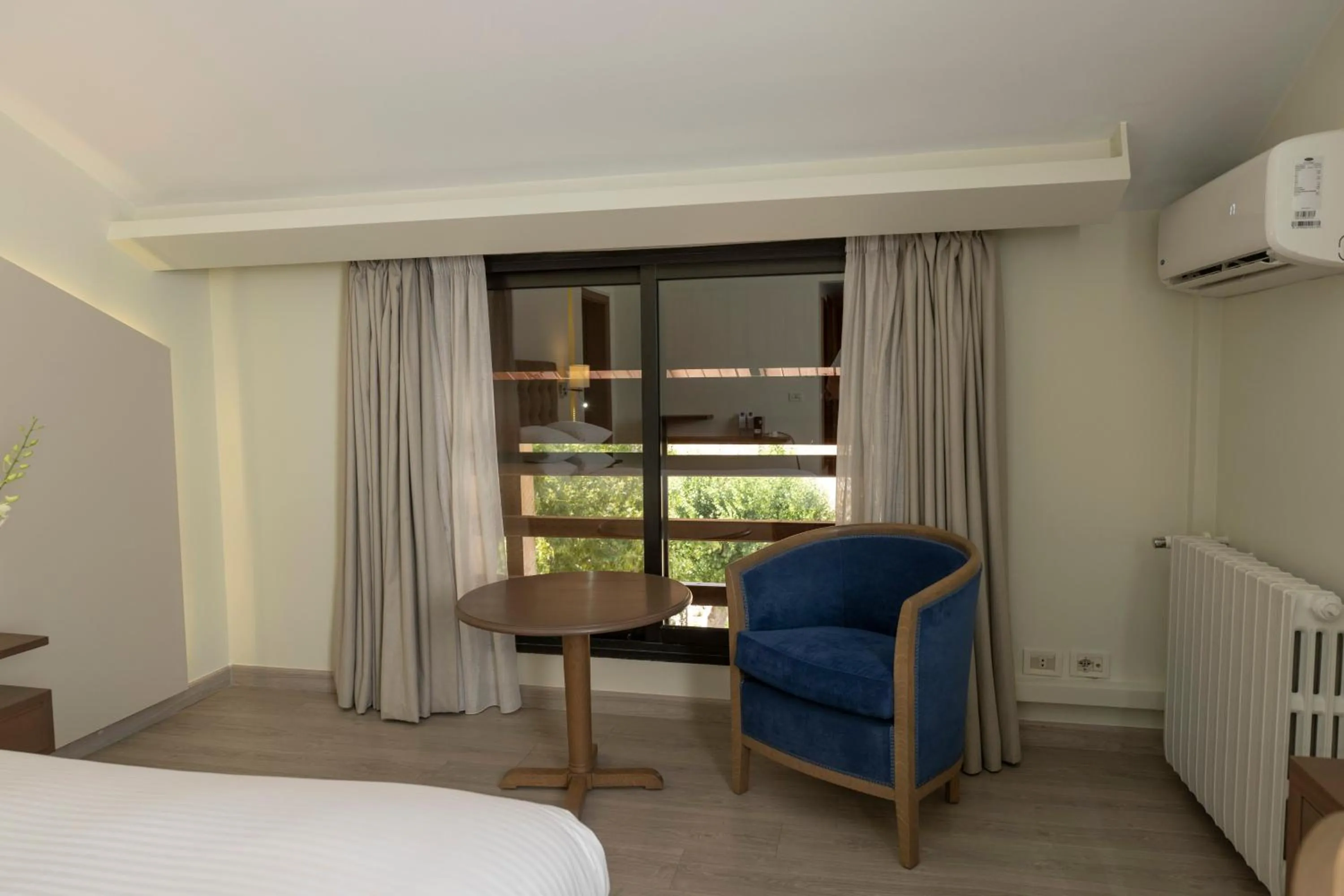 Photo of the whole room, Bed in InterContinental Mzaar Lebanon Mountain Resort & Spa by IHG