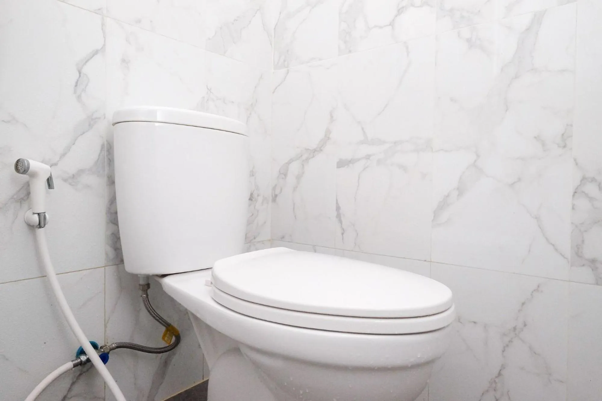 Toilet in RedDoorz near Sleman City Hall Yogyakarta