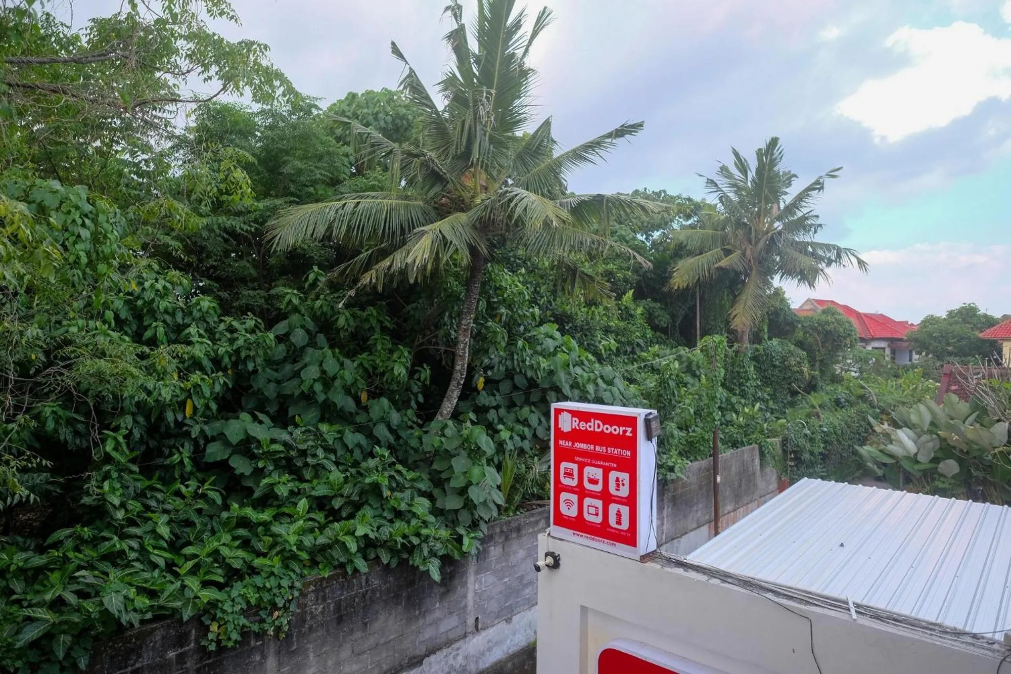 Property logo or sign in RedDoorz near Sleman City Hall Yogyakarta