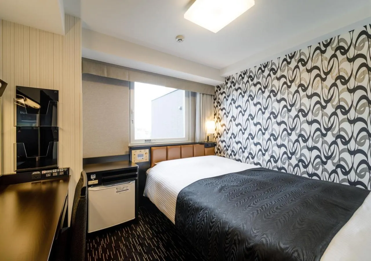 Photo of the whole room, Bed in APA Hotel Hakata Ekimae 3Chome