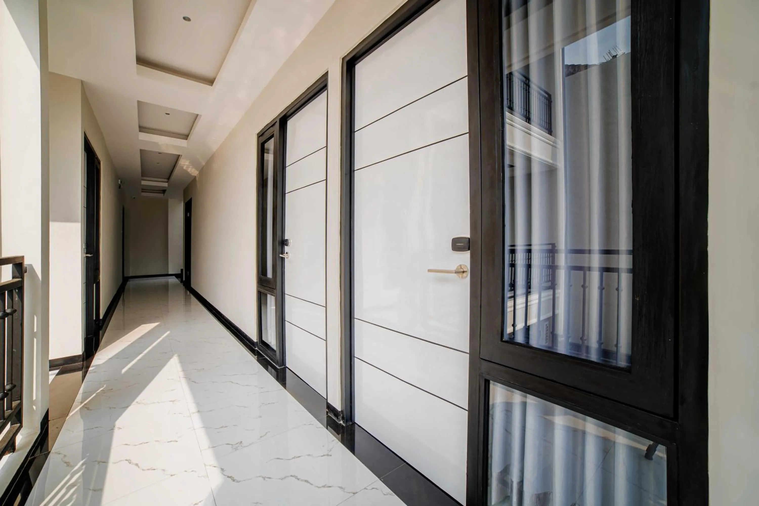 Facade/entrance in Tree Homestay Mitra RedDoorz