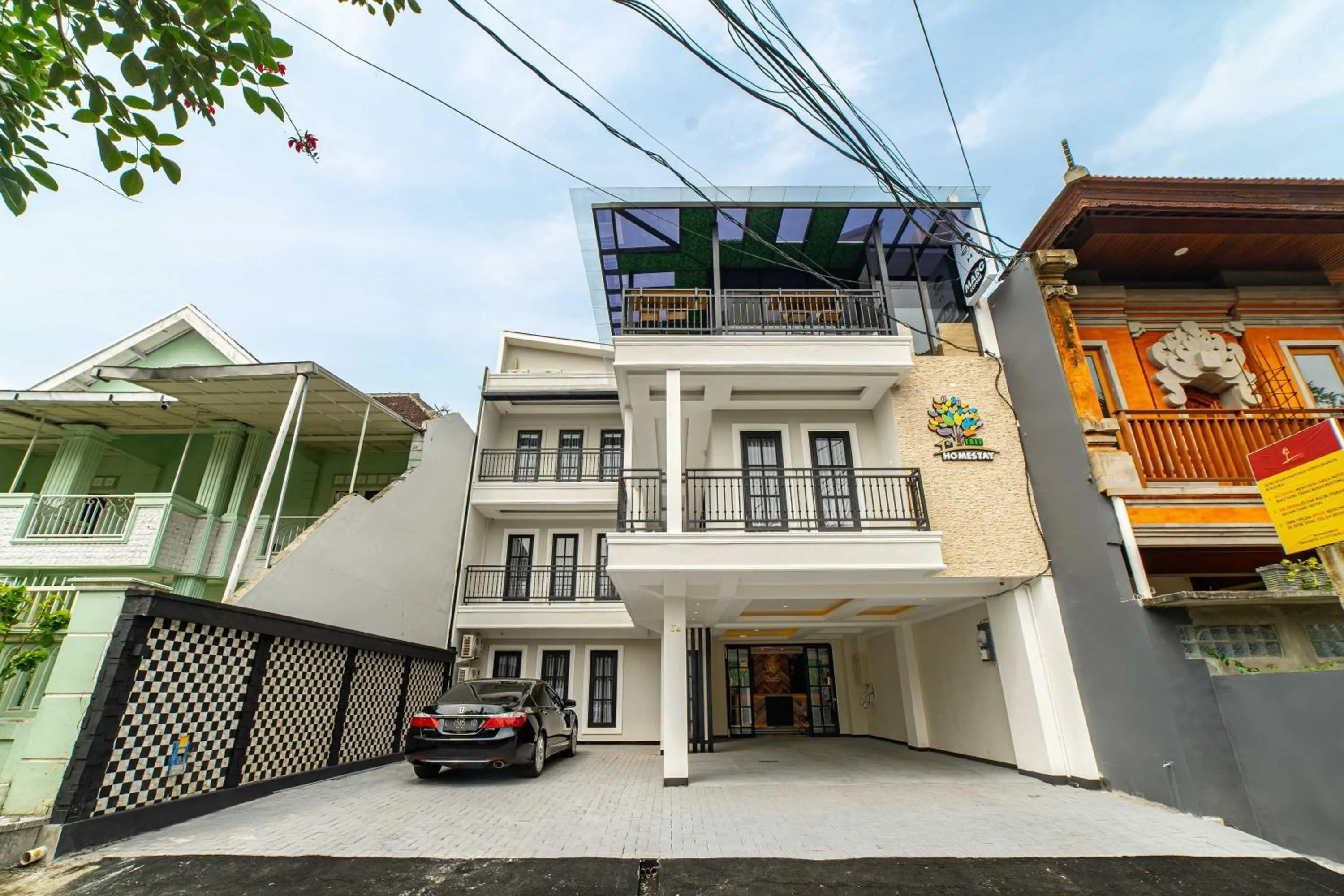 Property building in Tree Homestay Mitra RedDoorz