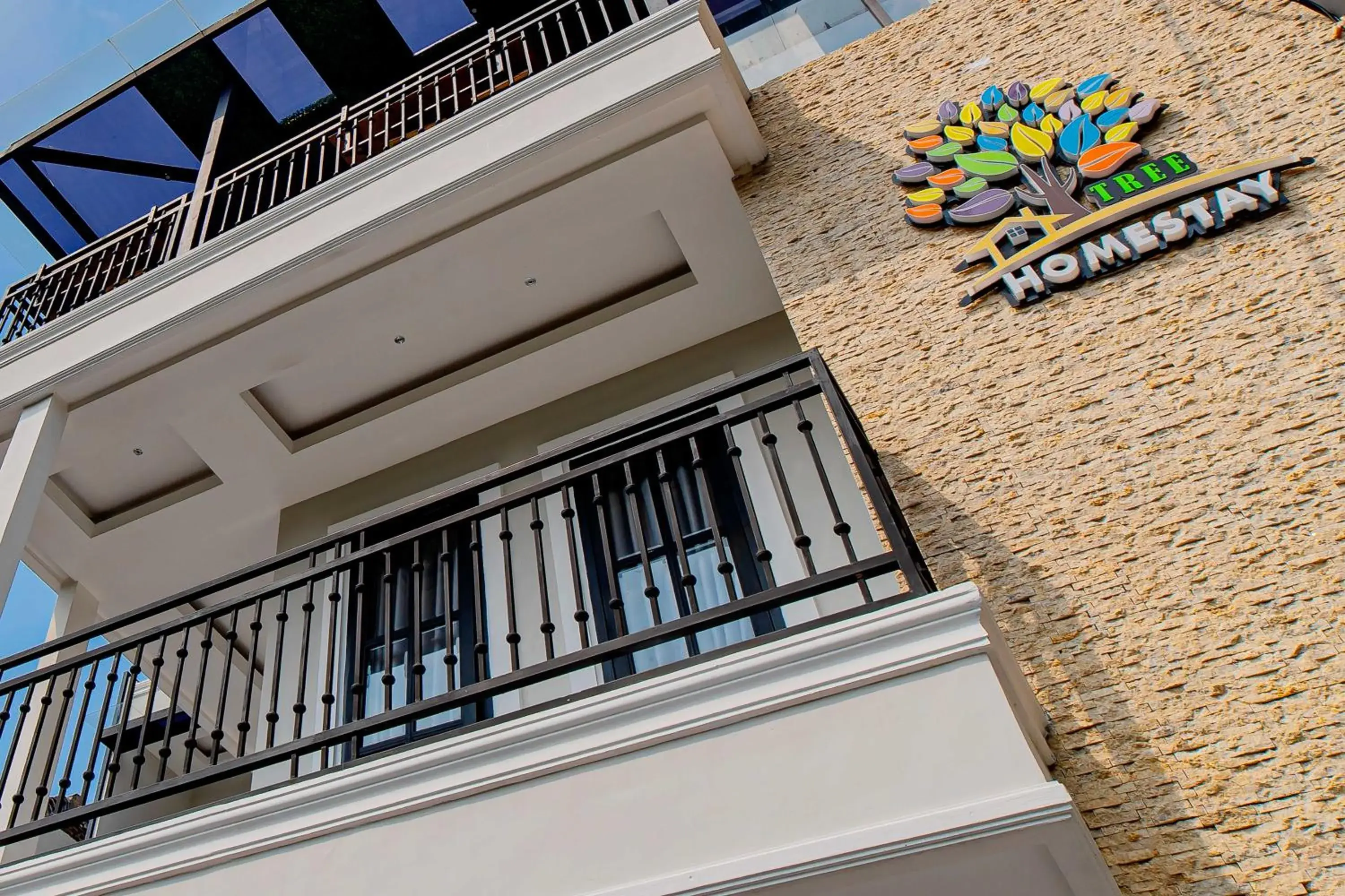 Property building in Tree Homestay Mitra RedDoorz Property building in Tree Homestay Mitra RedDoorz