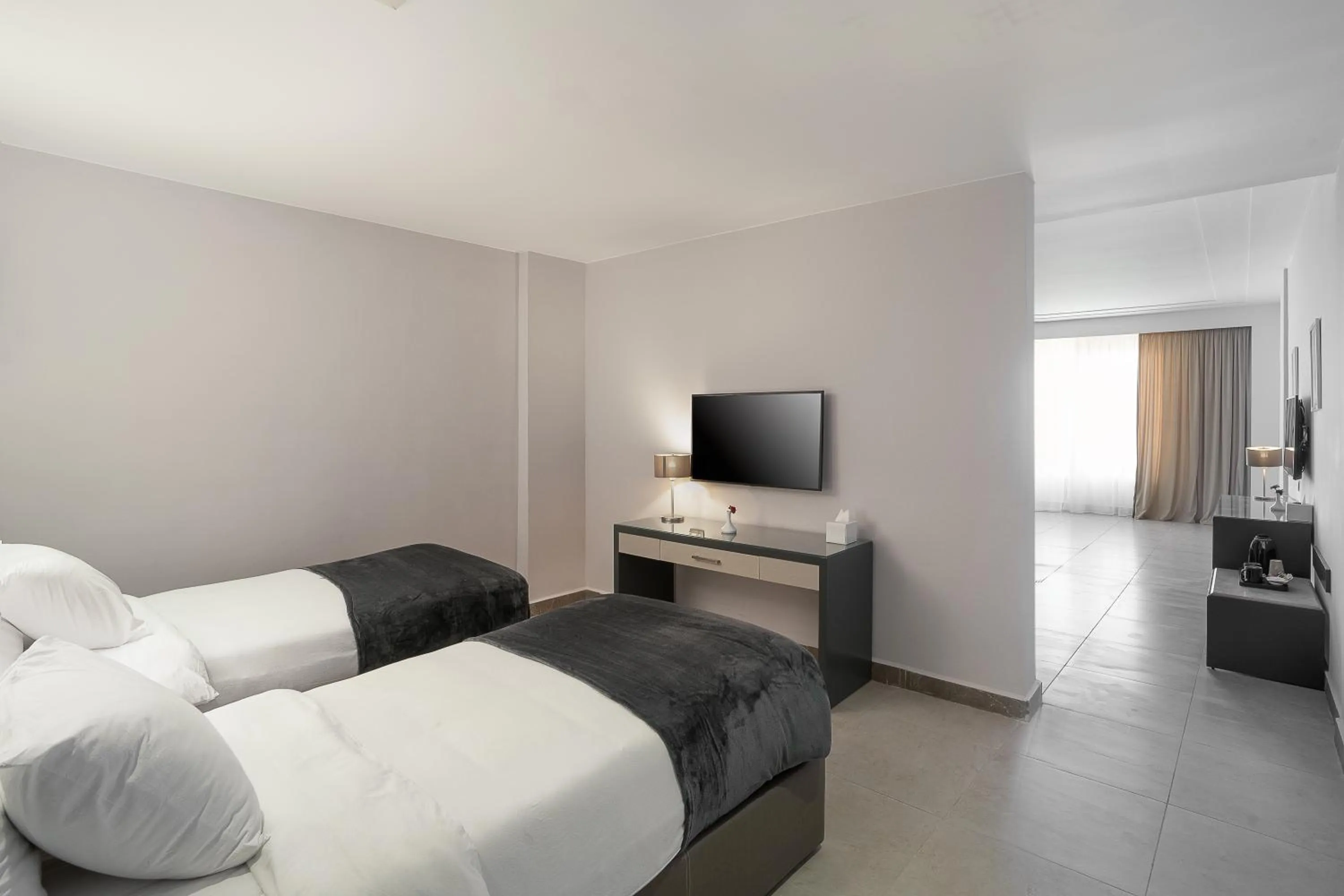 Photo of the whole room, Bed in Rhactus Hotel, New Alamein