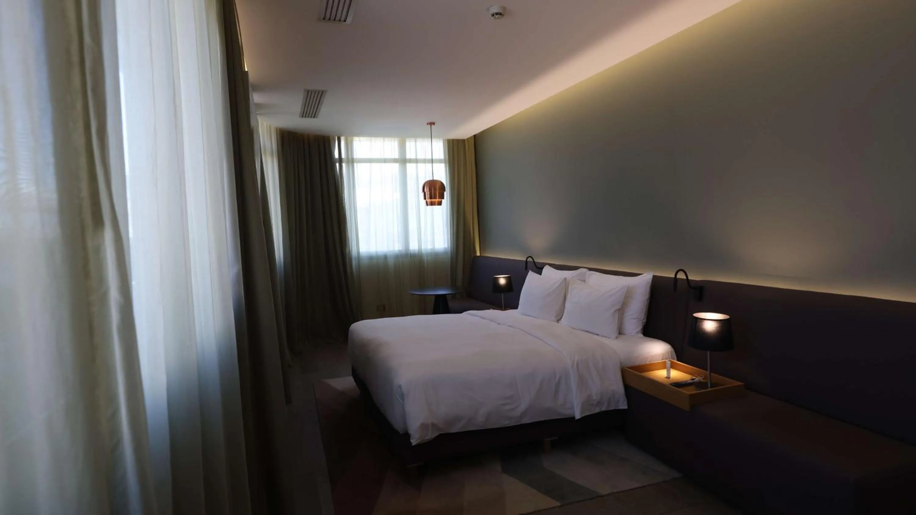 Photo of the whole room, Bed in Radisson Blu Hotel, Beirut Verdun