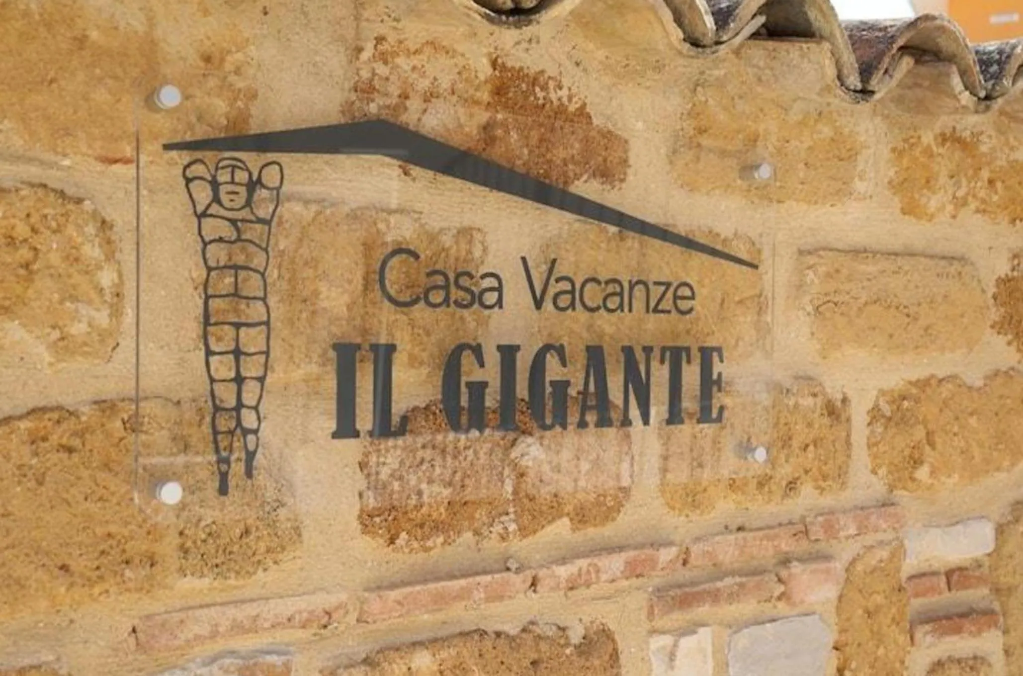 Property logo or sign in Casa Vacanze IL GIGANTE Comfort a Due Passi dalla Valle dei Templi