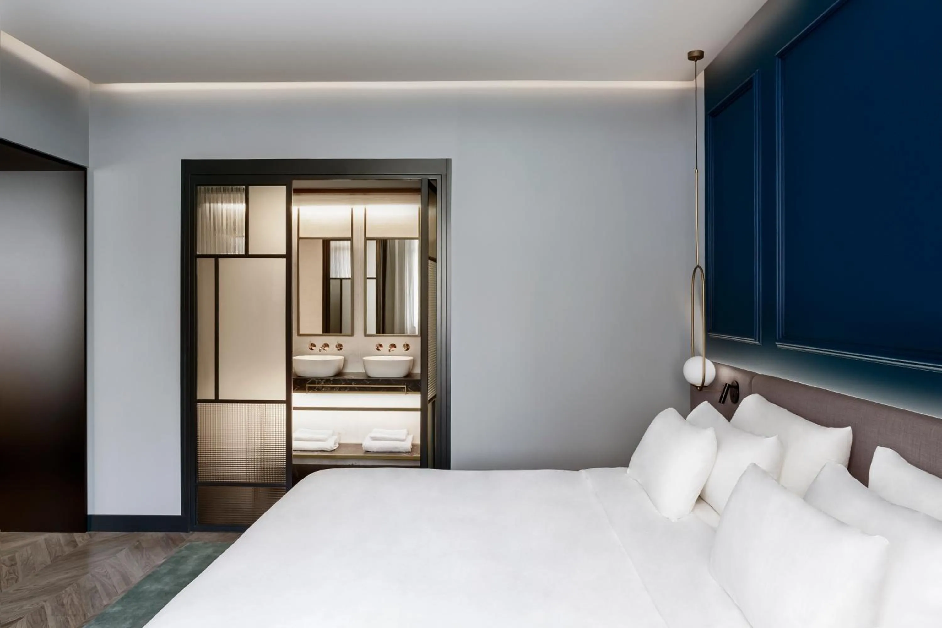 Bathroom, Bed in Radisson Collection Bilbao