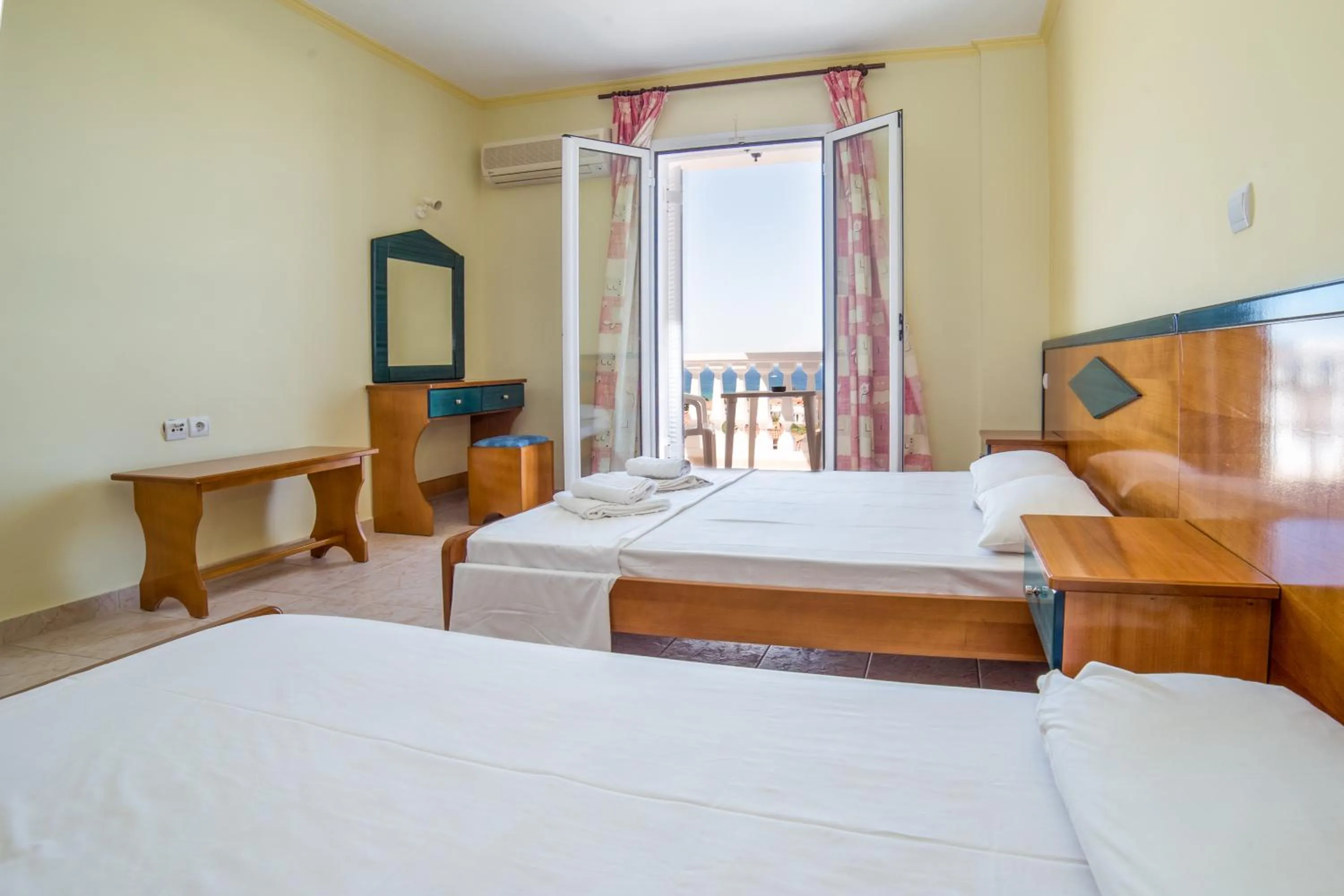 Photo of the whole room, Bed in All In Krinas Apart-Hotel