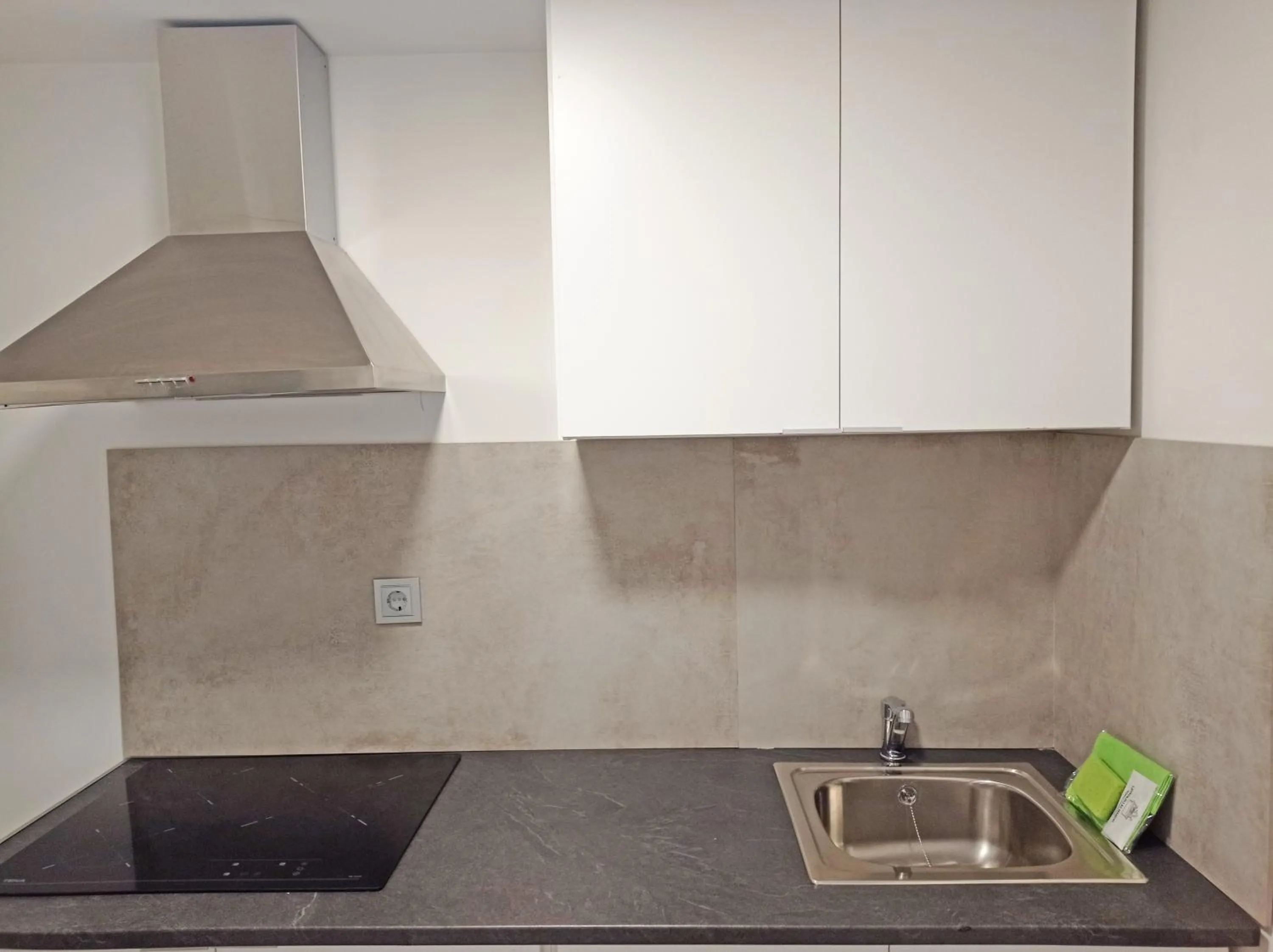 Kitchen or kitchenette in Apartamentos Santander Maliaño Suites 3000