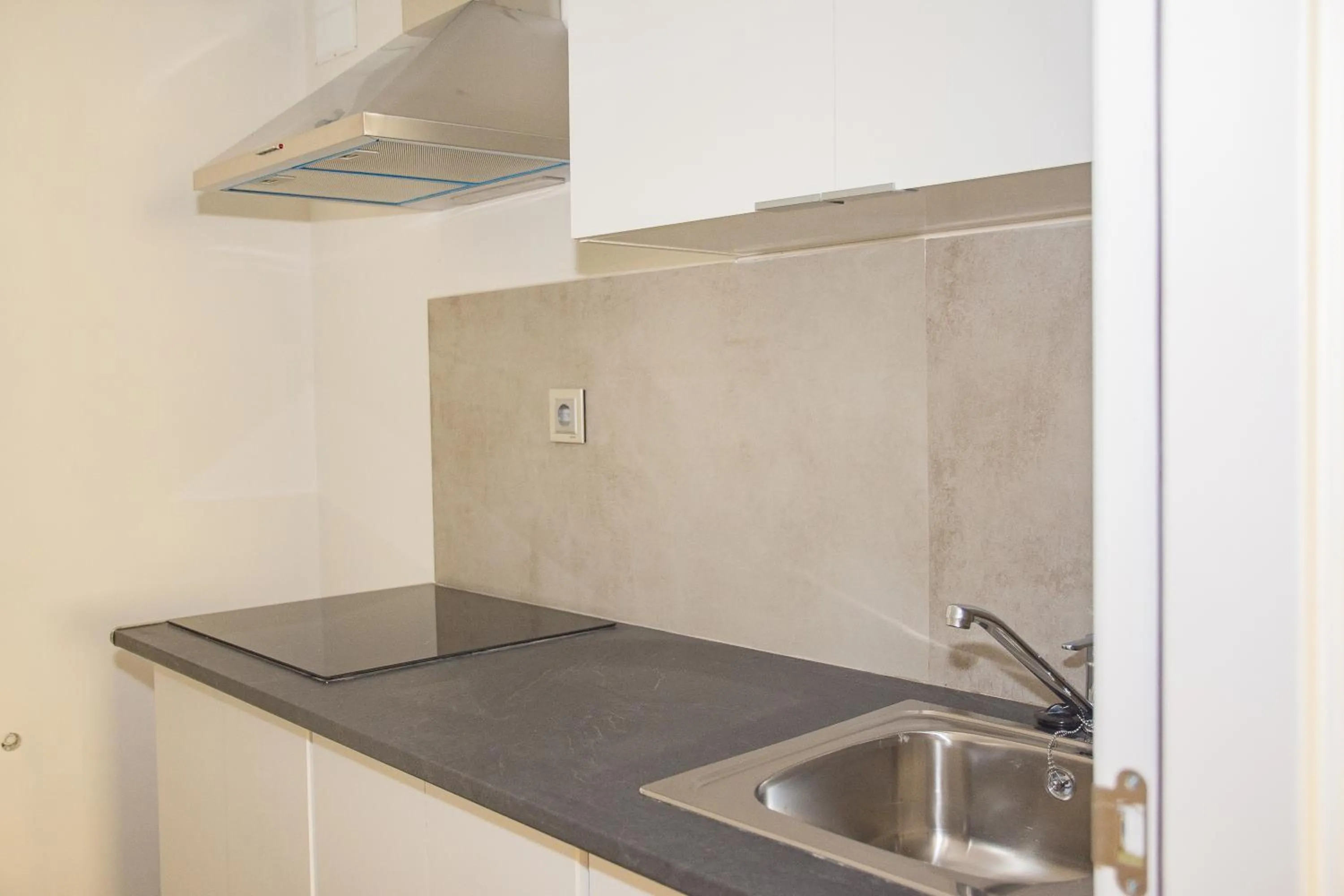Kitchen or kitchenette in Apartamentos Santander Maliaño Suites 3000