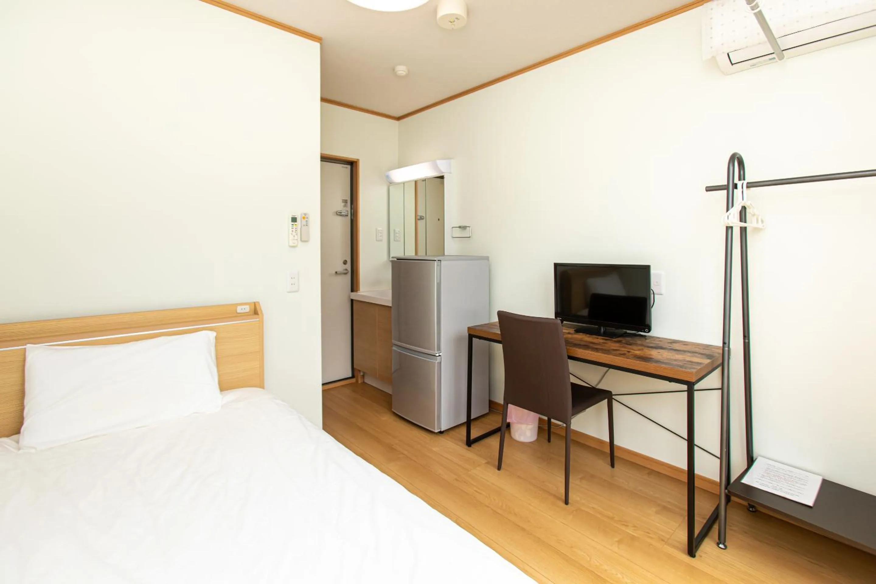 Bed in Tabist Hotel Takagiya Iwaki