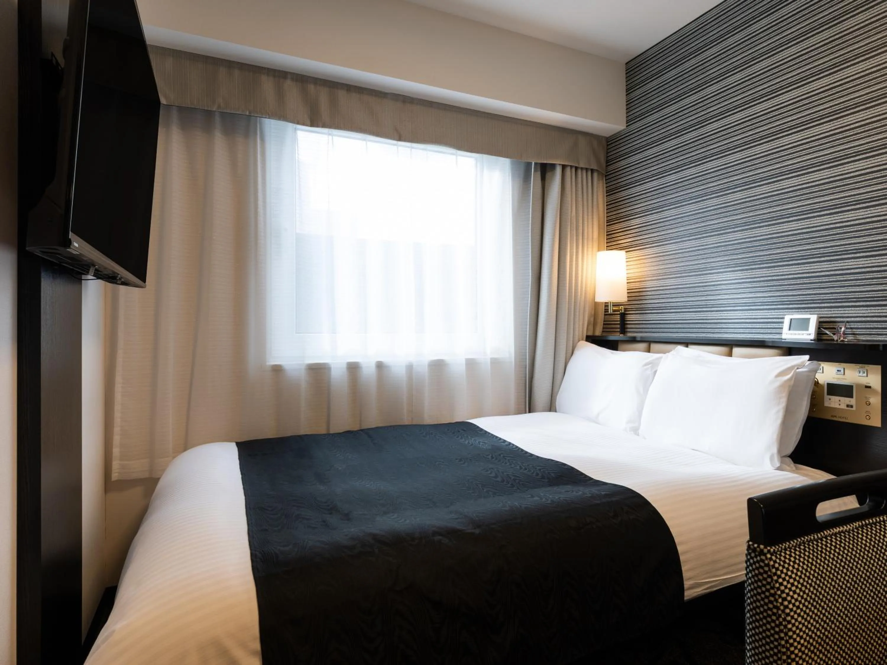 Photo of the whole room, Bed in APA Hotel Kintetsu-Nara Ekimae