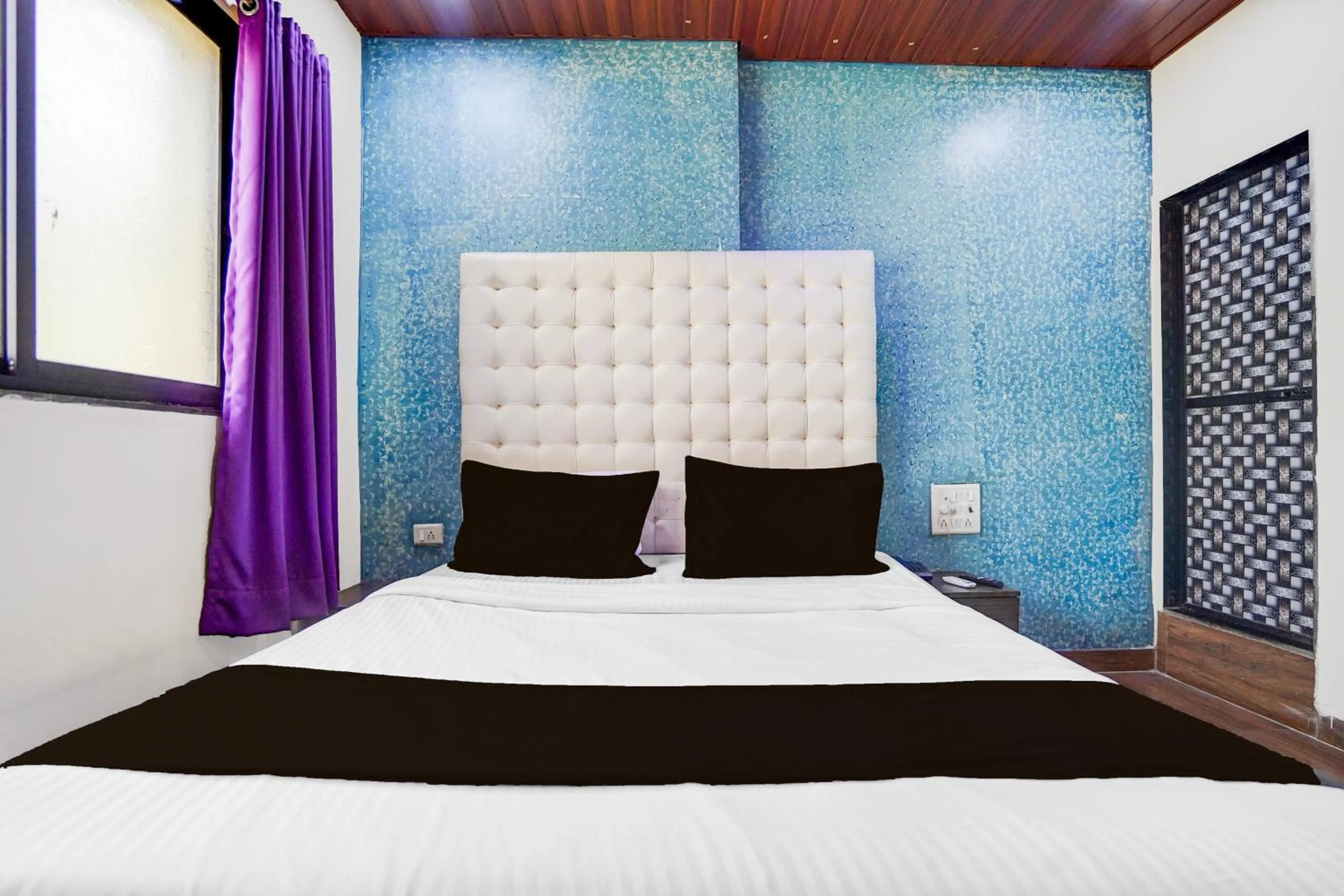 Bedroom, Bed in Hotel O The Om Sai Residency